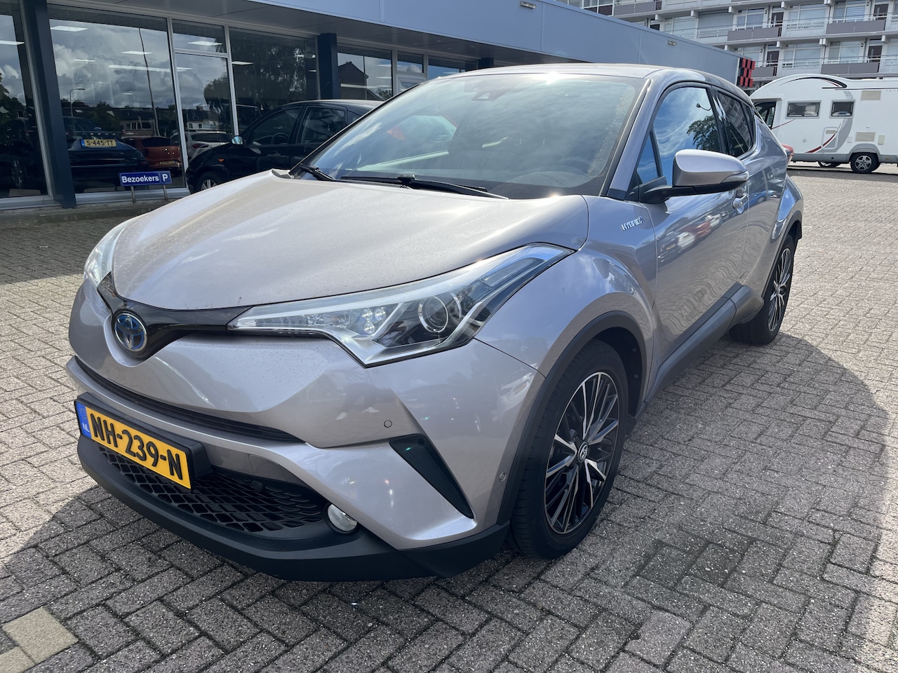 Toyota C-HR - 1.8 Hybrid Executive Pdc Klima A camera Cruise Lmv Nap - AutoWereld.nl