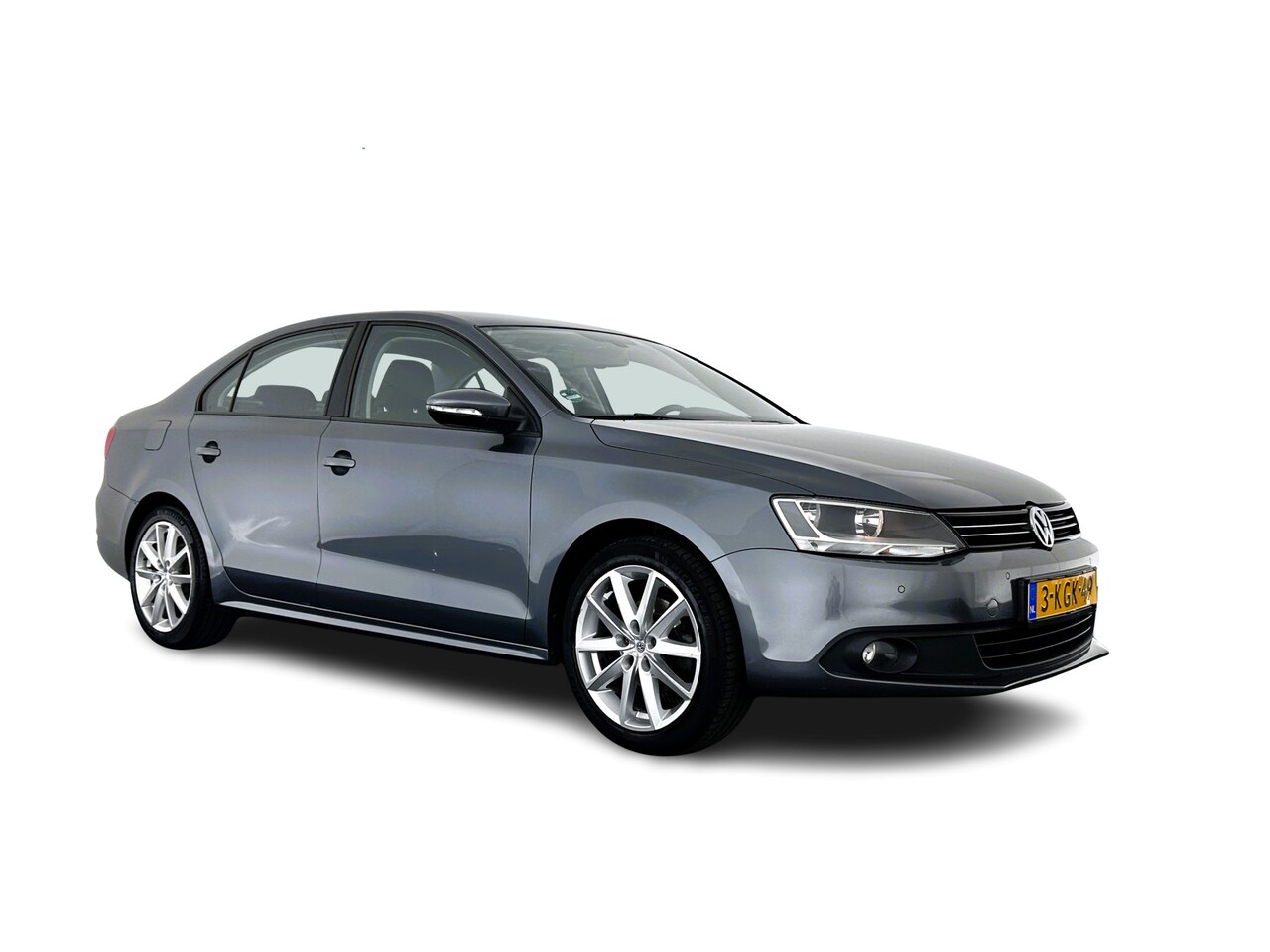 Volkswagen Jetta - 1.6 TDI Comfort Executive Line BlueMotion *AIRCO | PDC | CRUISE | 17''ALU* - AutoWereld.nl