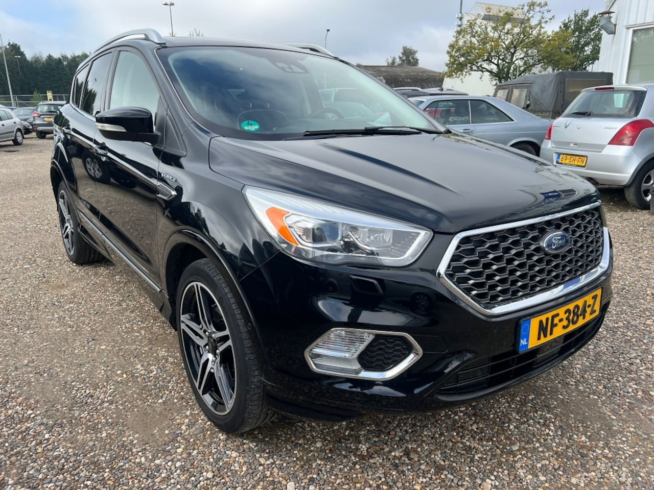 Ford Kuga - 1.5 EcoB. Vignale - AutoWereld.nl