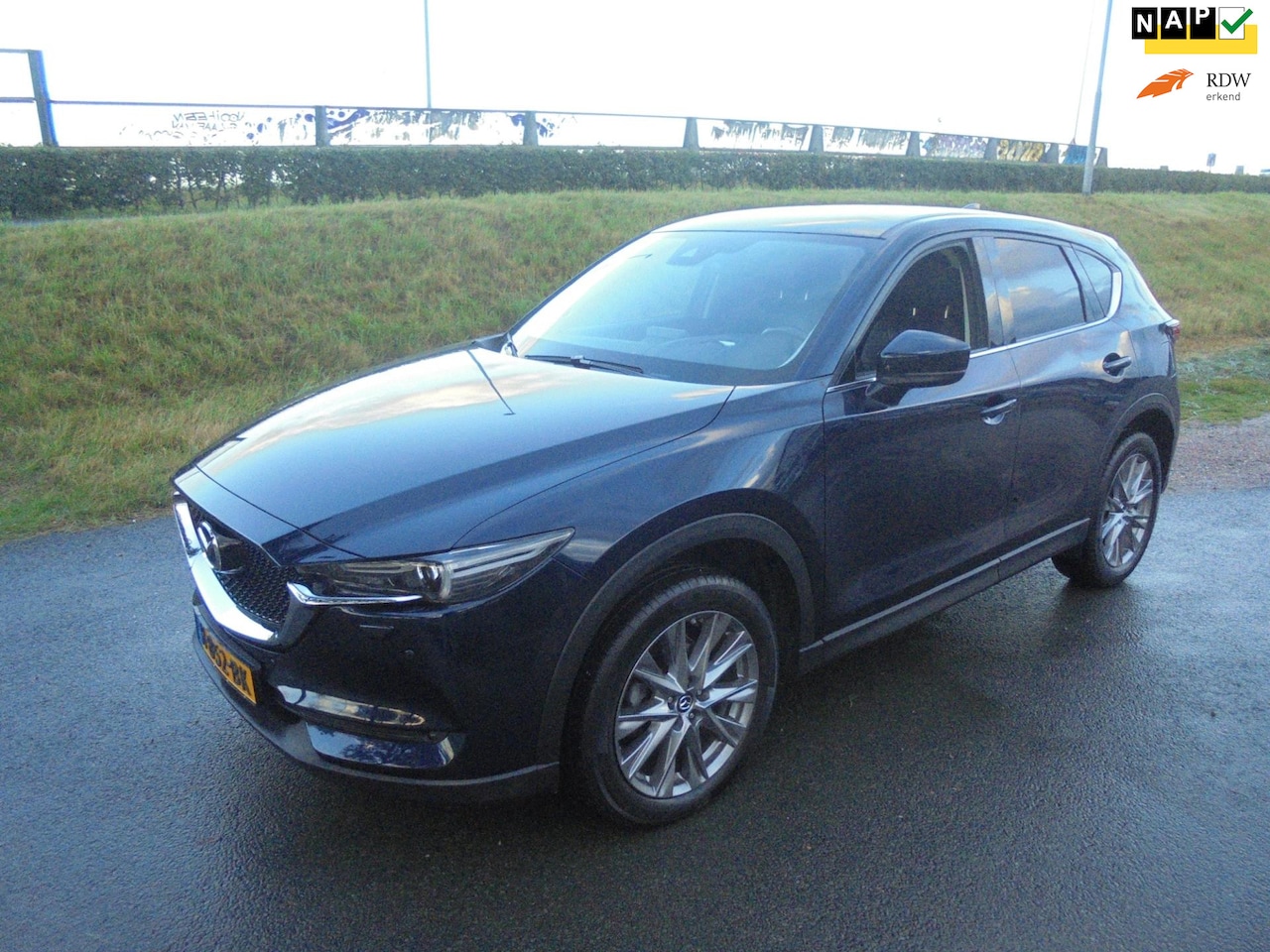 Mazda CX-5 - Cx5 2.0 benzine AUTOMAAT airco ecc lmv xenon zwart leer navigatie - AutoWereld.nl