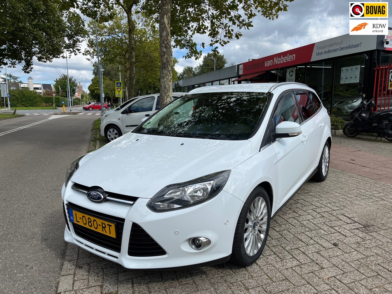 Ford Focus Wagon - 1.0 EcoBoost Titanium|CRUISE CONTROL|AIRCO|TREKHAAK|PDC|ISOFIX - AutoWereld.nl