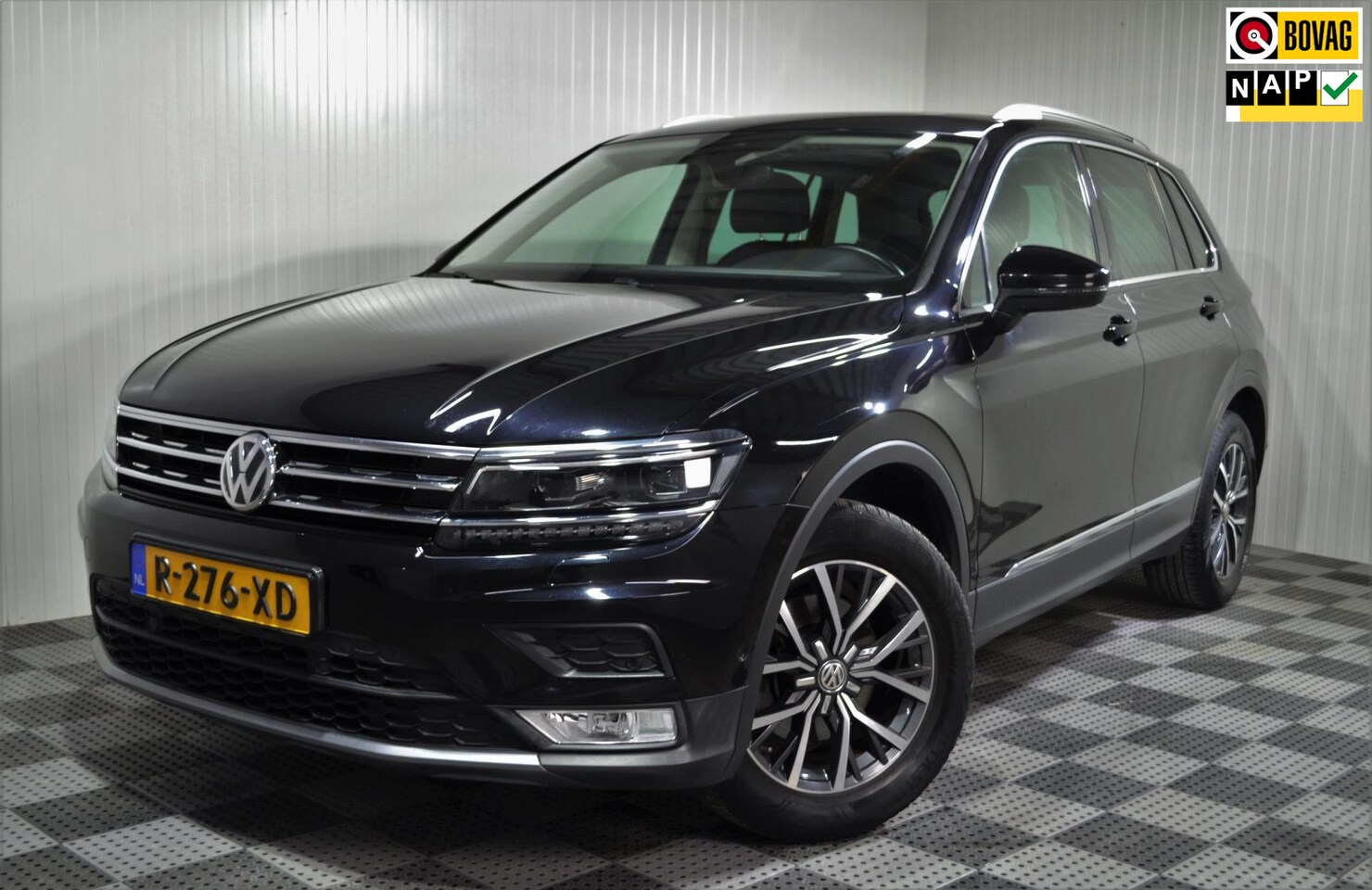 Volkswagen Tiguan - 1.4 TSI Conn. Series Model 2017 / Trekhaak / Pano.dak / Stoelverwarming - AutoWereld.nl