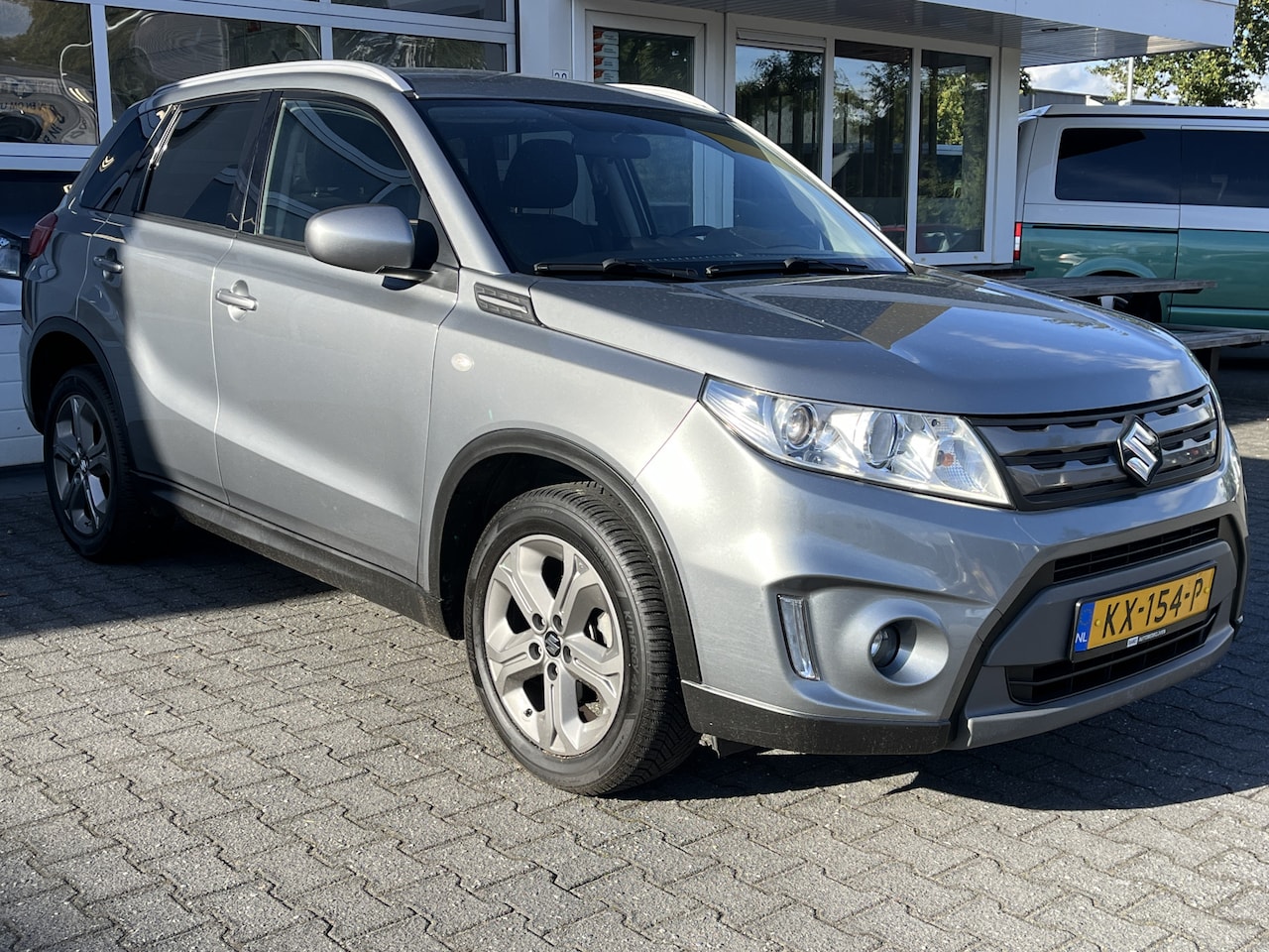 Suzuki Vitara - 1.6 Exclusive Navigatie Camera Cruise control Climate control Stoelverwarming - AutoWereld.nl