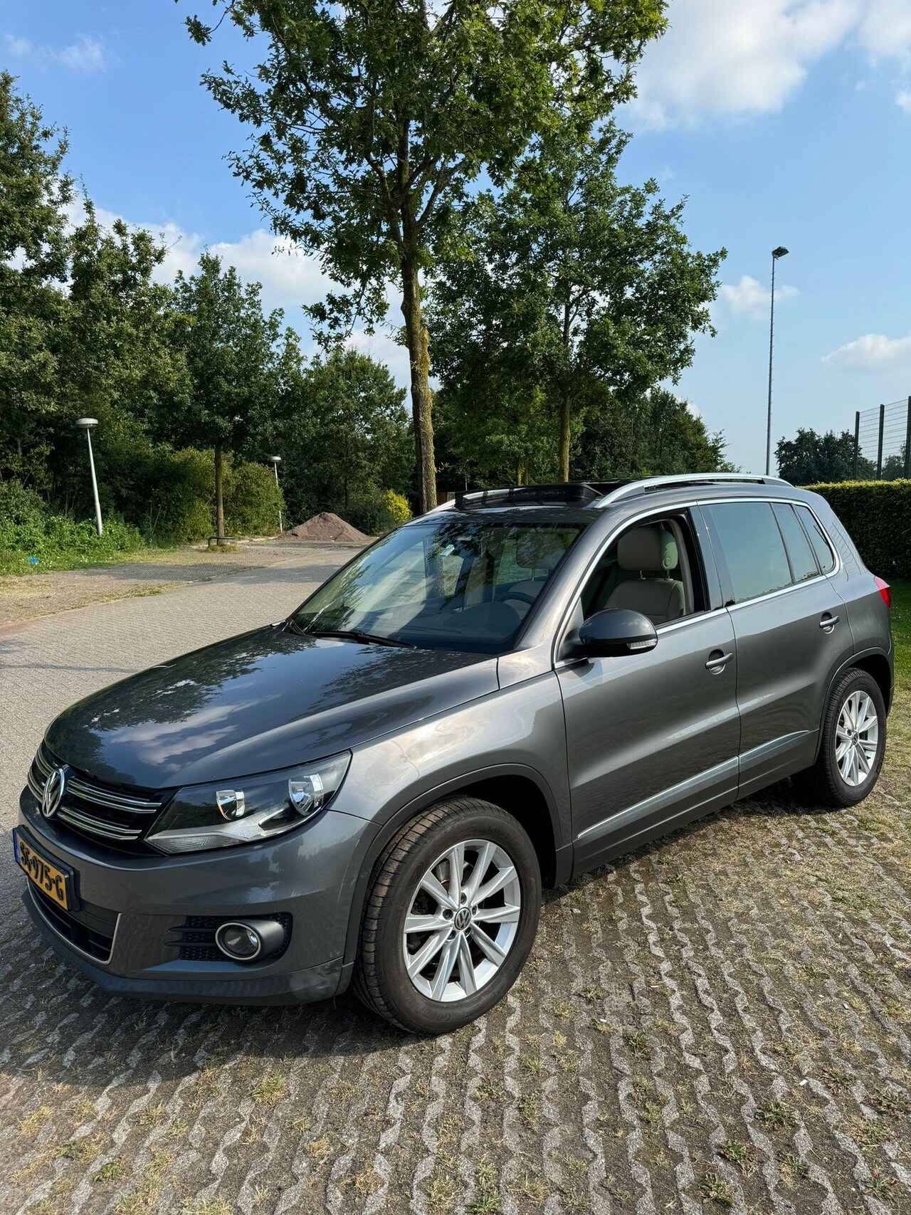 Volkswagen Tiguan - 2.0 TDI Sport&Style R-line Edition - AutoWereld.nl