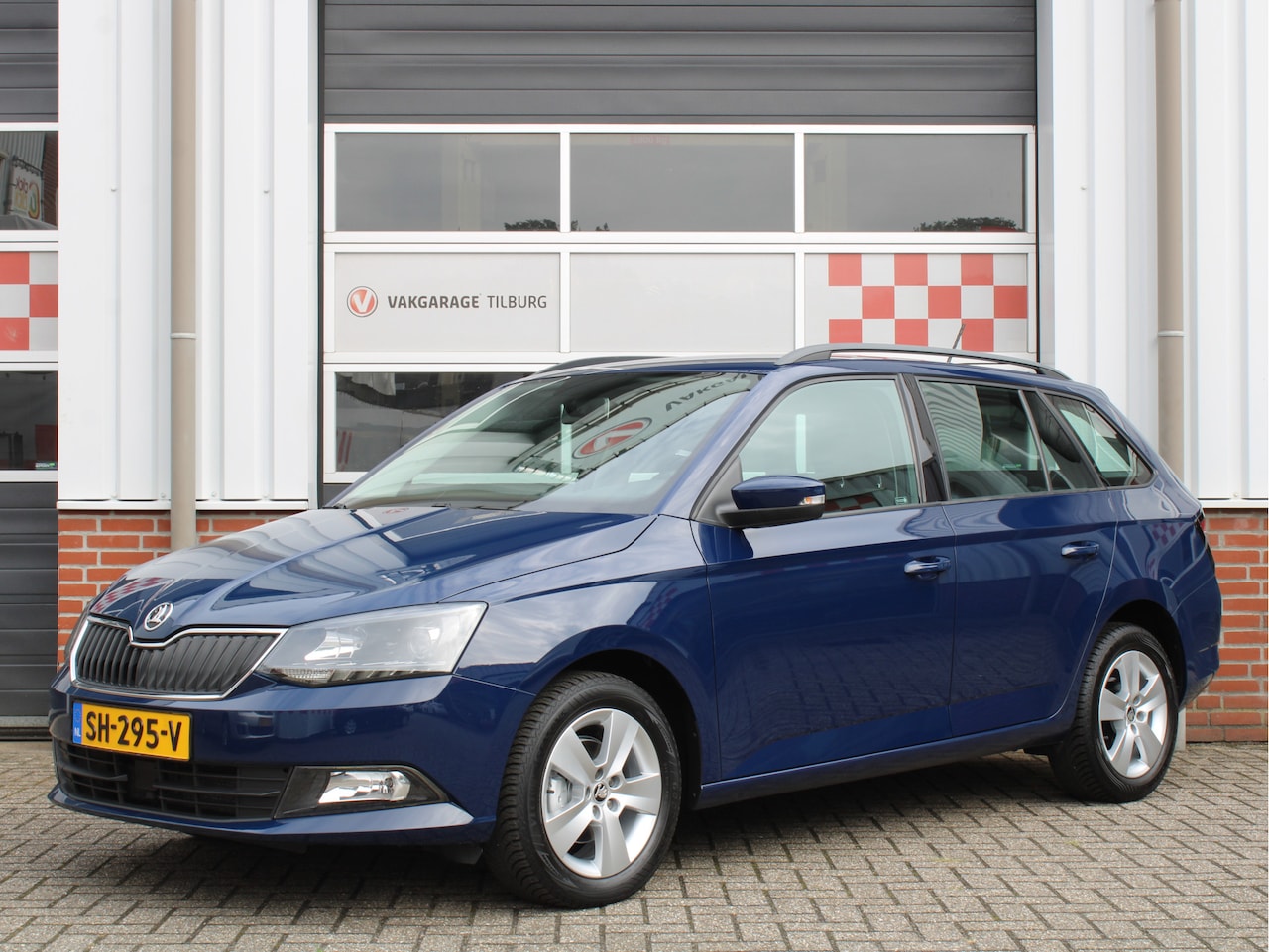 Skoda Fabia Combi - 1.0 TSI Ambition Business /NAVI/PDC/Cruise control/AIRCO/LED/15'LM/CV/Bluetooth/USB+AUX/IS - AutoWereld.nl