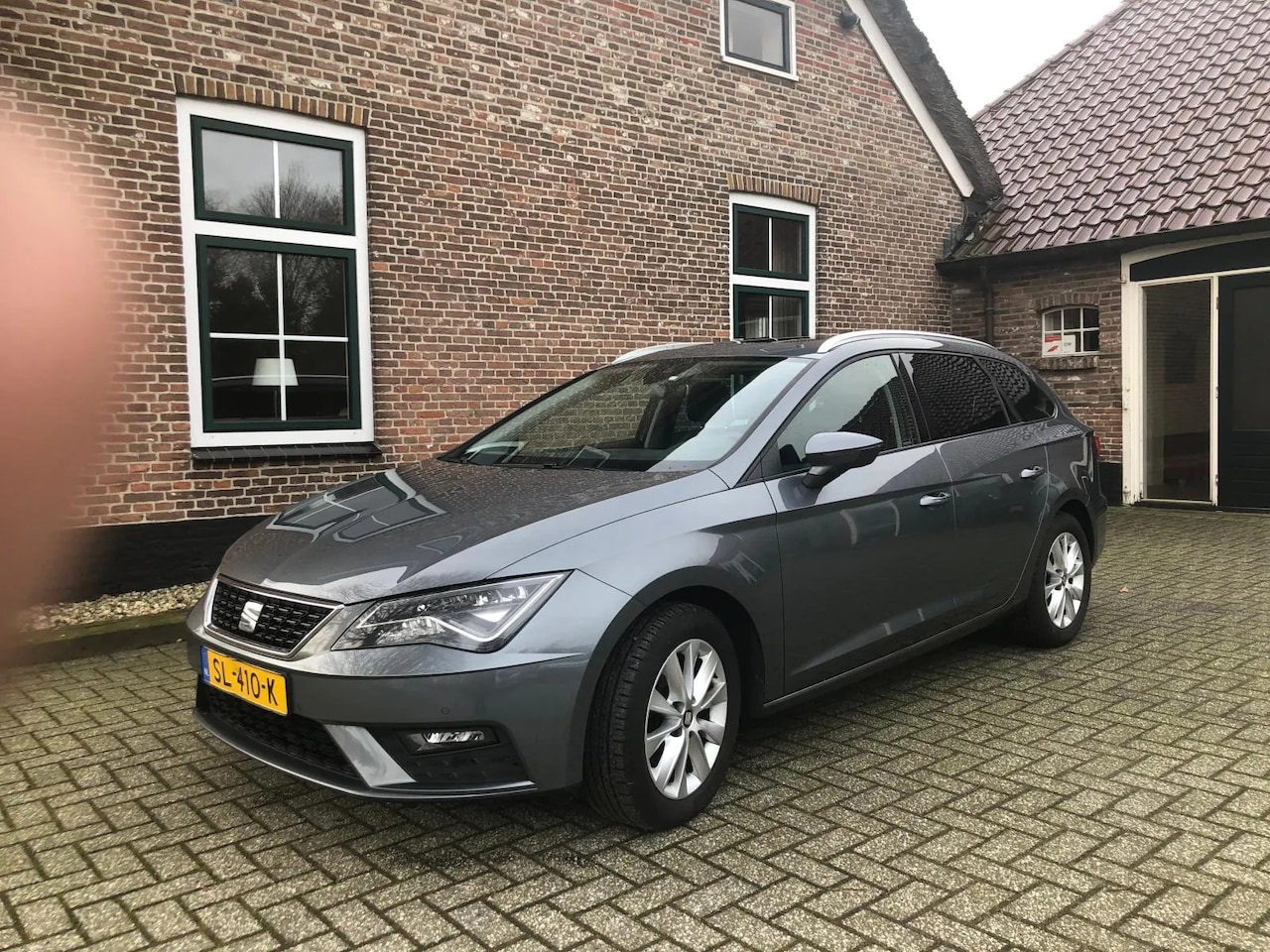 Seat Leon ST - 1.6 TDI Style Business Intense Panoramadak - AutoWereld.nl