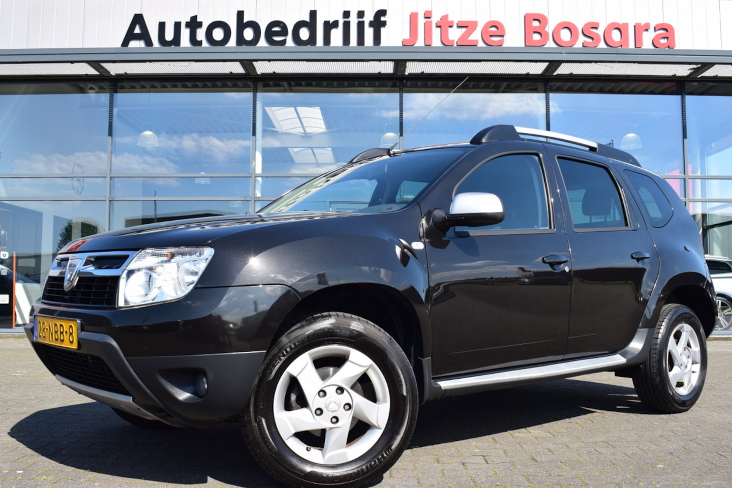 Dacia Duster - 1.6 Lauréate Airco | Originele Audio | 16 Inc LMV | Isofix | Volledig Onderhouden!! - AutoWereld.nl