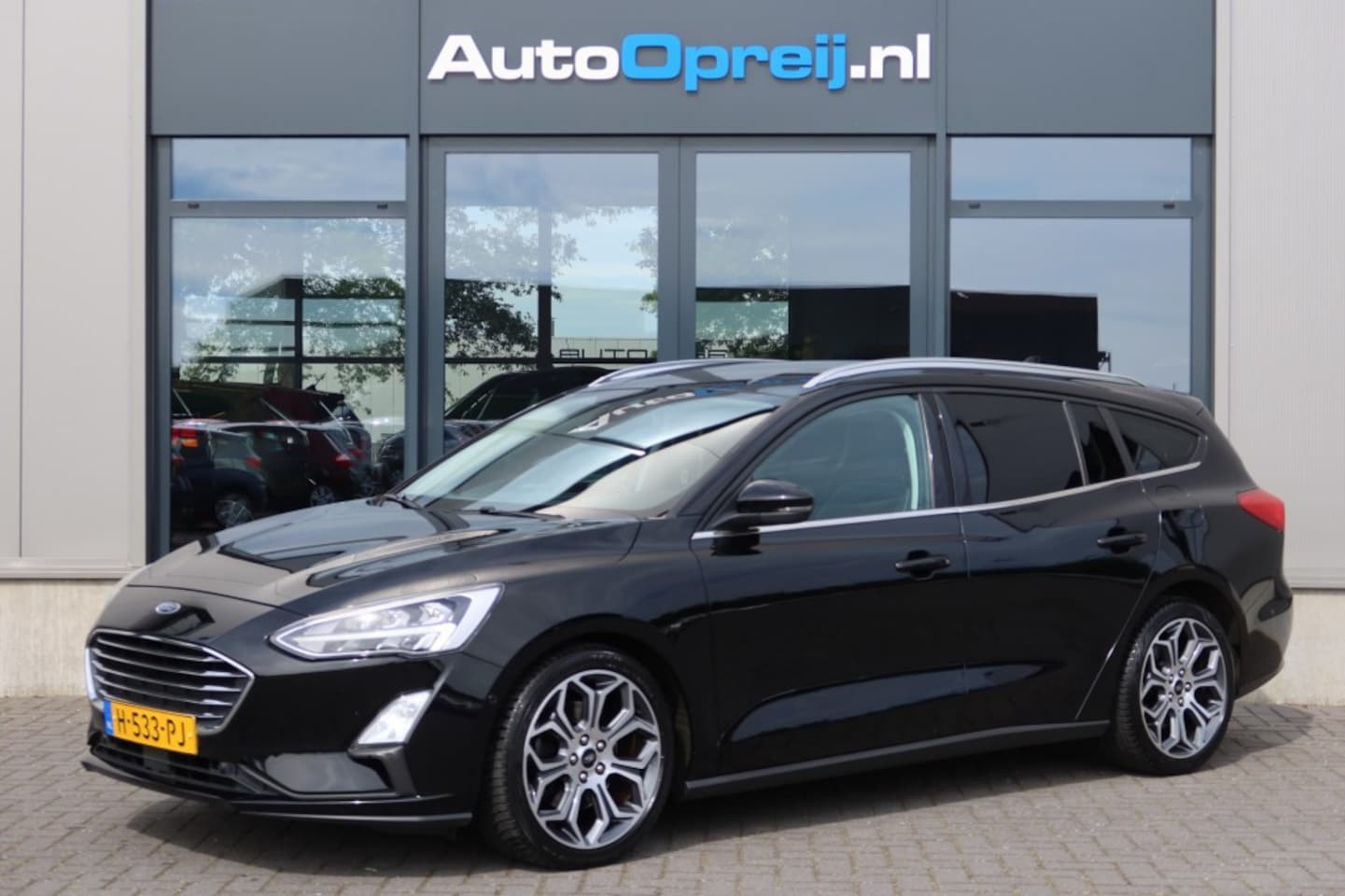 Ford Focus - 1.0 EcoBoost 125pk AUTOMAAT Titanium Business Trekhaak, Camera, - AutoWereld.nl