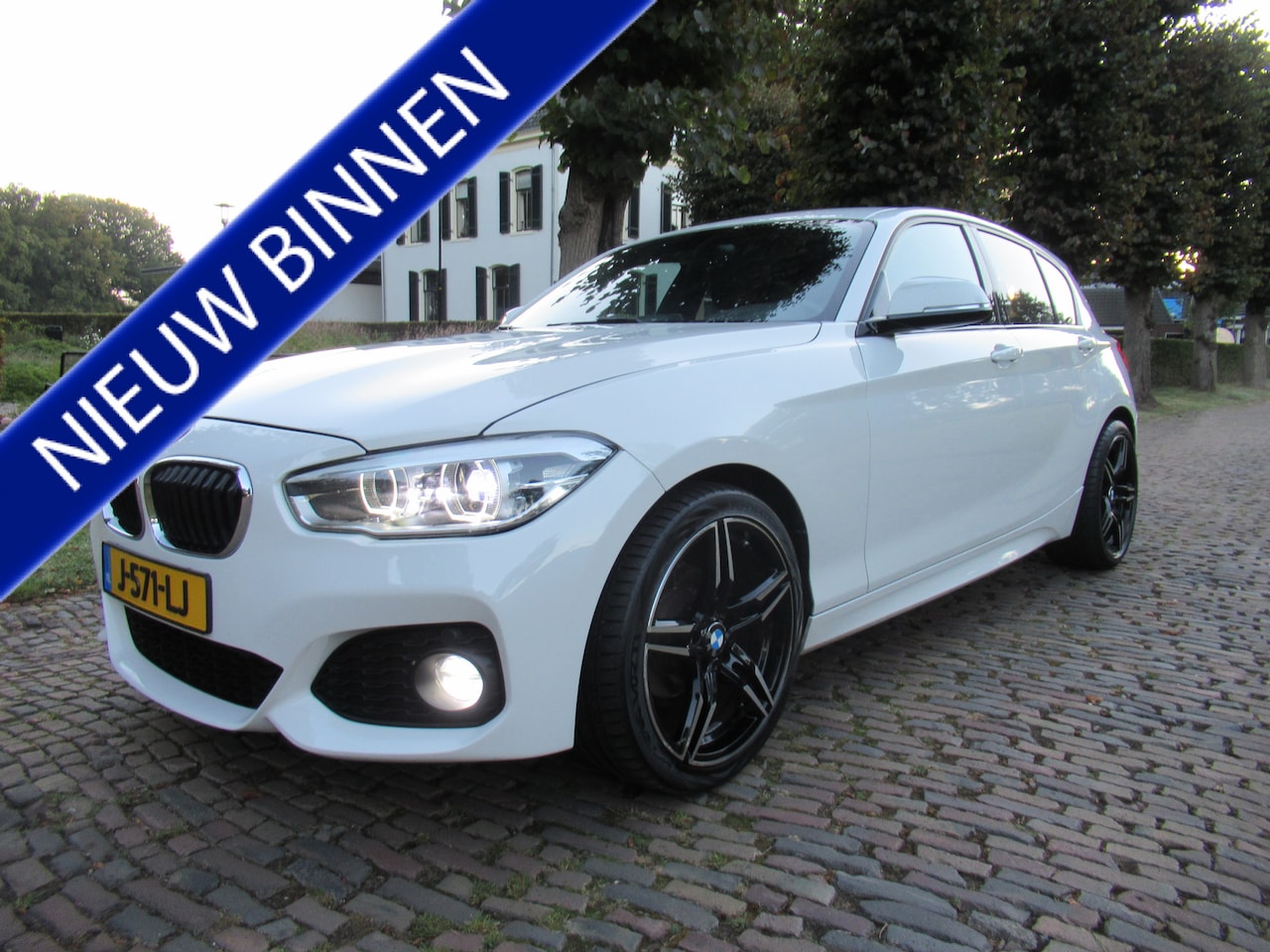 BMW 1-serie - 118i Edition M Sport Shadow Executive Leer Ecc Cruisecontrol Led Navigatie Stoelverwarming - AutoWereld.nl