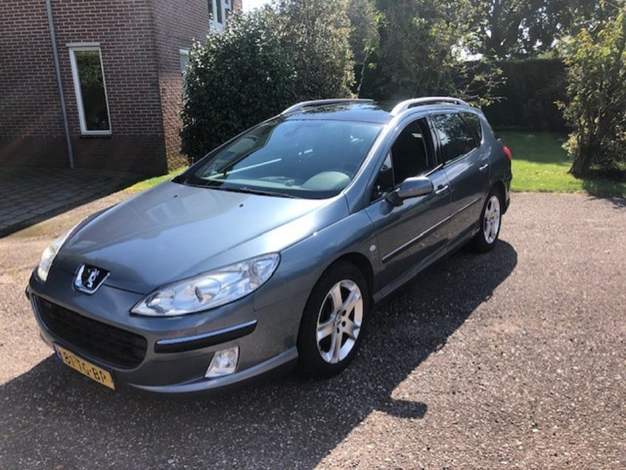 Peugeot 407 SW - 2.0-16V XR Pack 2.0 16V Panorama dak Full options - AutoWereld.nl