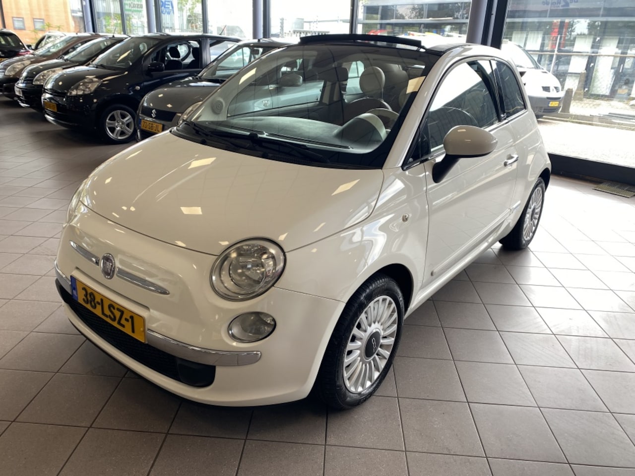 Fiat 500 C - 1.2 Lounge Cabrio AUTOMAAT LEDER NW APK BJ 2010 !!! - AutoWereld.nl