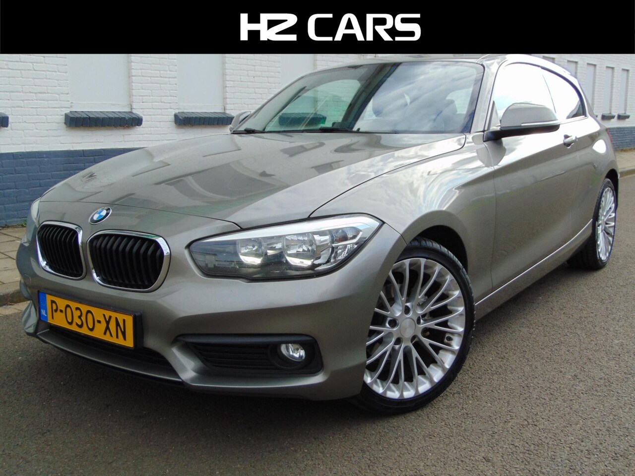 BMW 1-serie - 116i Essential MET Nieuwe APK - AutoWereld.nl