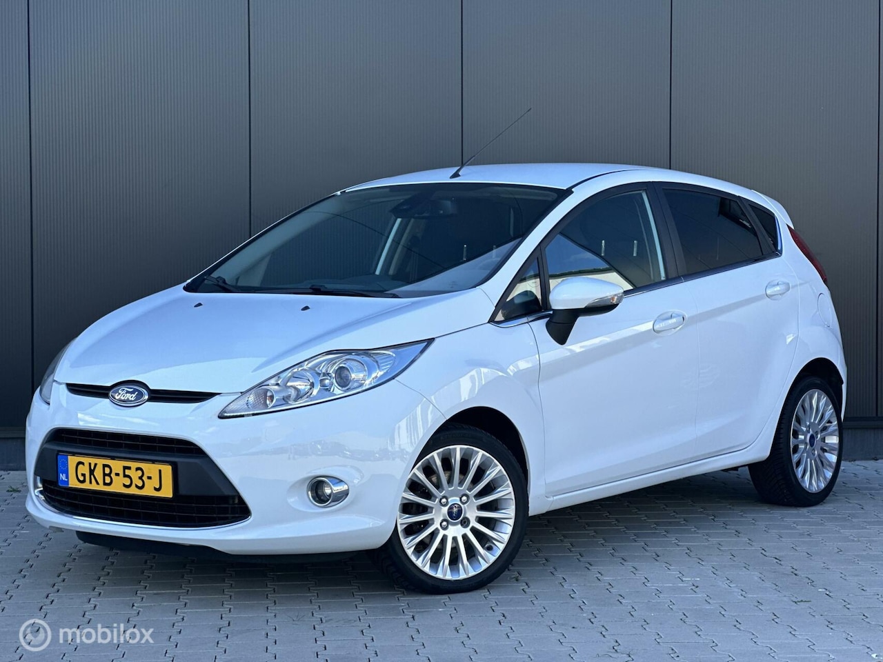 Ford Fiesta - 1.25 Titanium | CLIMA | STOELVERWARMING | VELGEN | - AutoWereld.nl