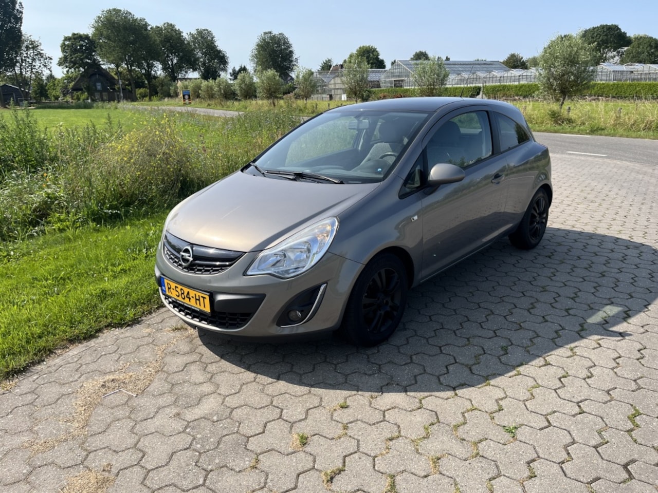 Opel Corsa - 1.4-16V 2012 slechts 131.000km - AutoWereld.nl