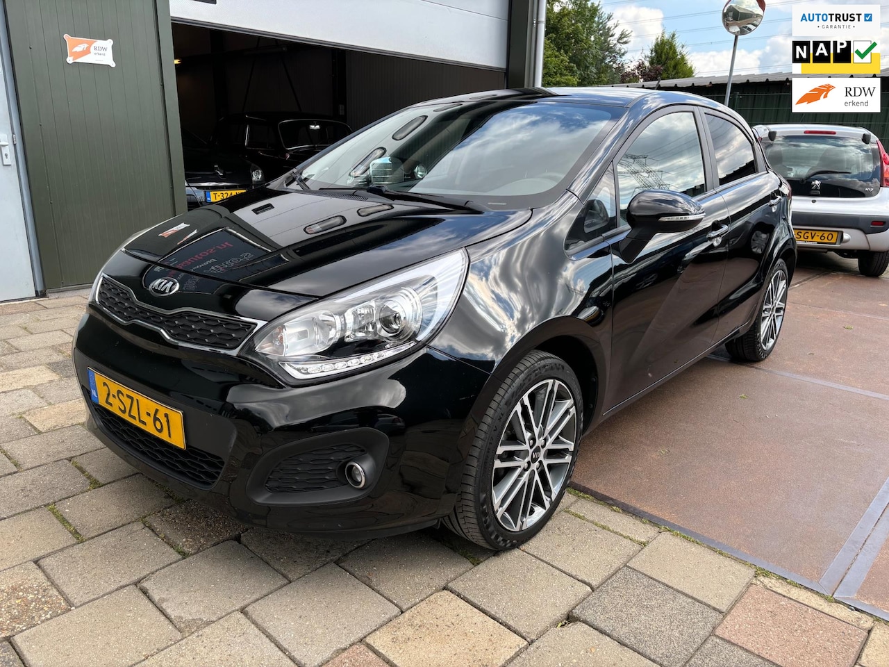 Kia Rio - 1.2 CVVT Plus Pack Airco Cruise - AutoWereld.nl