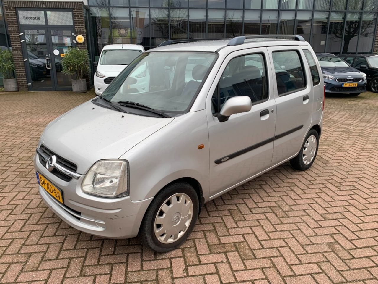 Opel Agila - 1.2 16V Color Edition met Airco - AutoWereld.nl