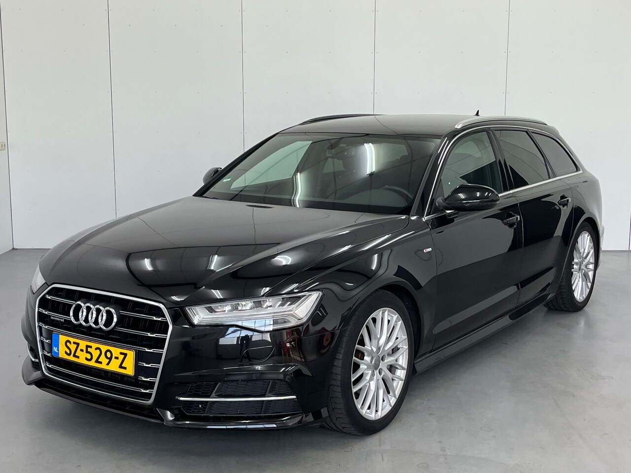 Audi A6 Avant - 2.0 TFSI quattro Advance Sport / S-Line / Automaat / Trekhaak - AutoWereld.nl