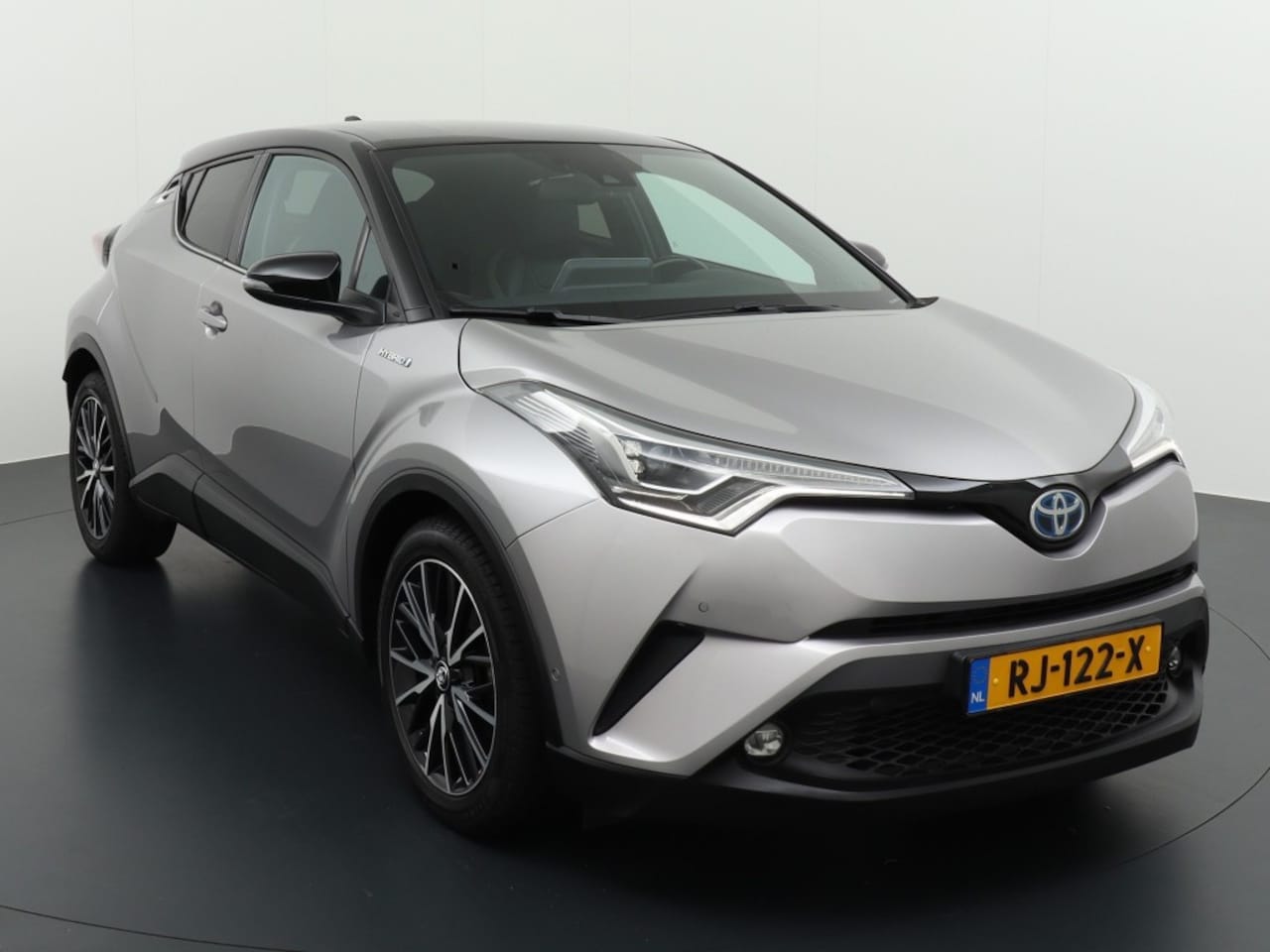 Toyota C-HR - 1.8 HYBRIDE ST PREMIUM ECC LEER.NAV.LED.TREKHAAK - AutoWereld.nl