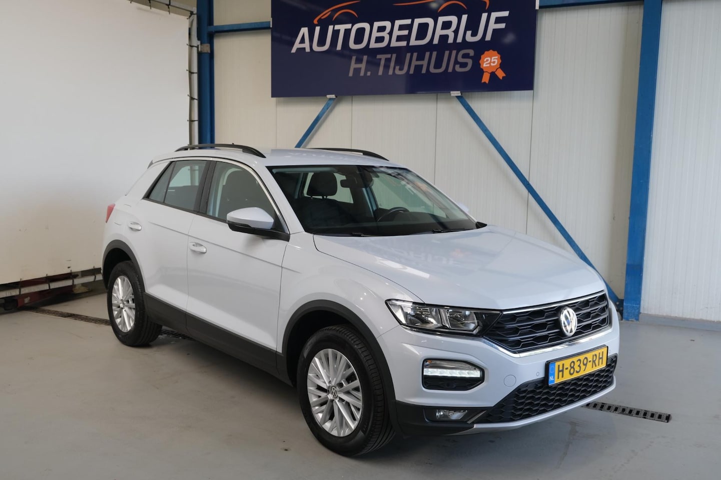 Volkswagen T-Roc - 1.5 TSI Style Automaat - N.A.P. Airco, Cruise, Navi, PDC. - AutoWereld.nl