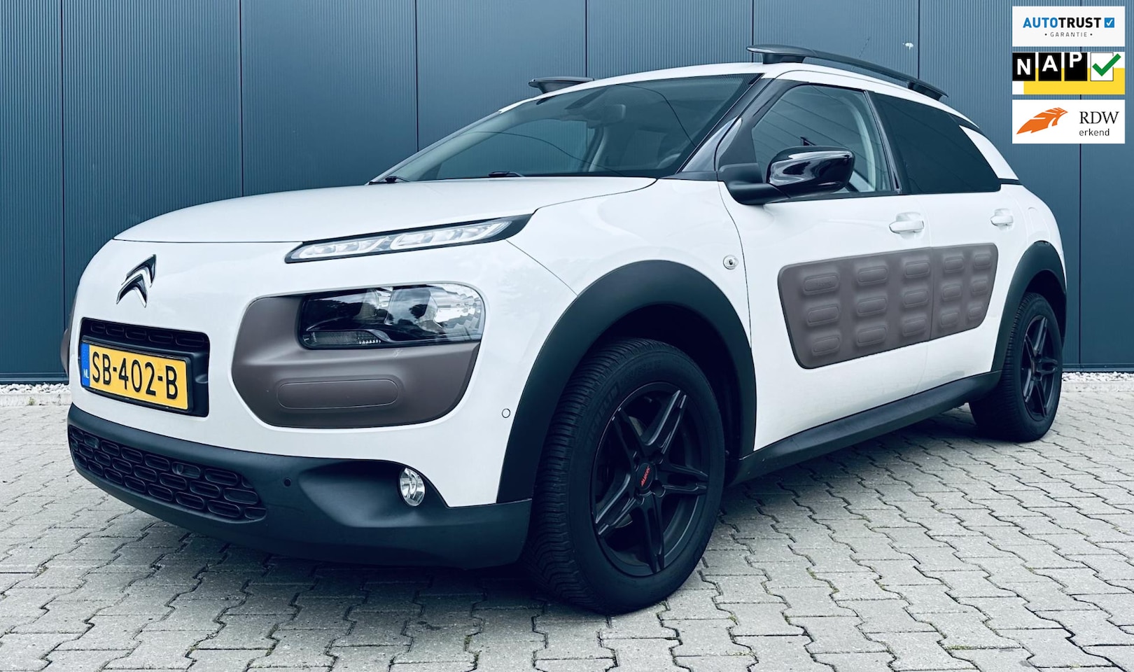 Citroën C4 Cactus - 1.2 PureTech Business Airco Cruise Navi Camera Pano Trekhaak - AutoWereld.nl