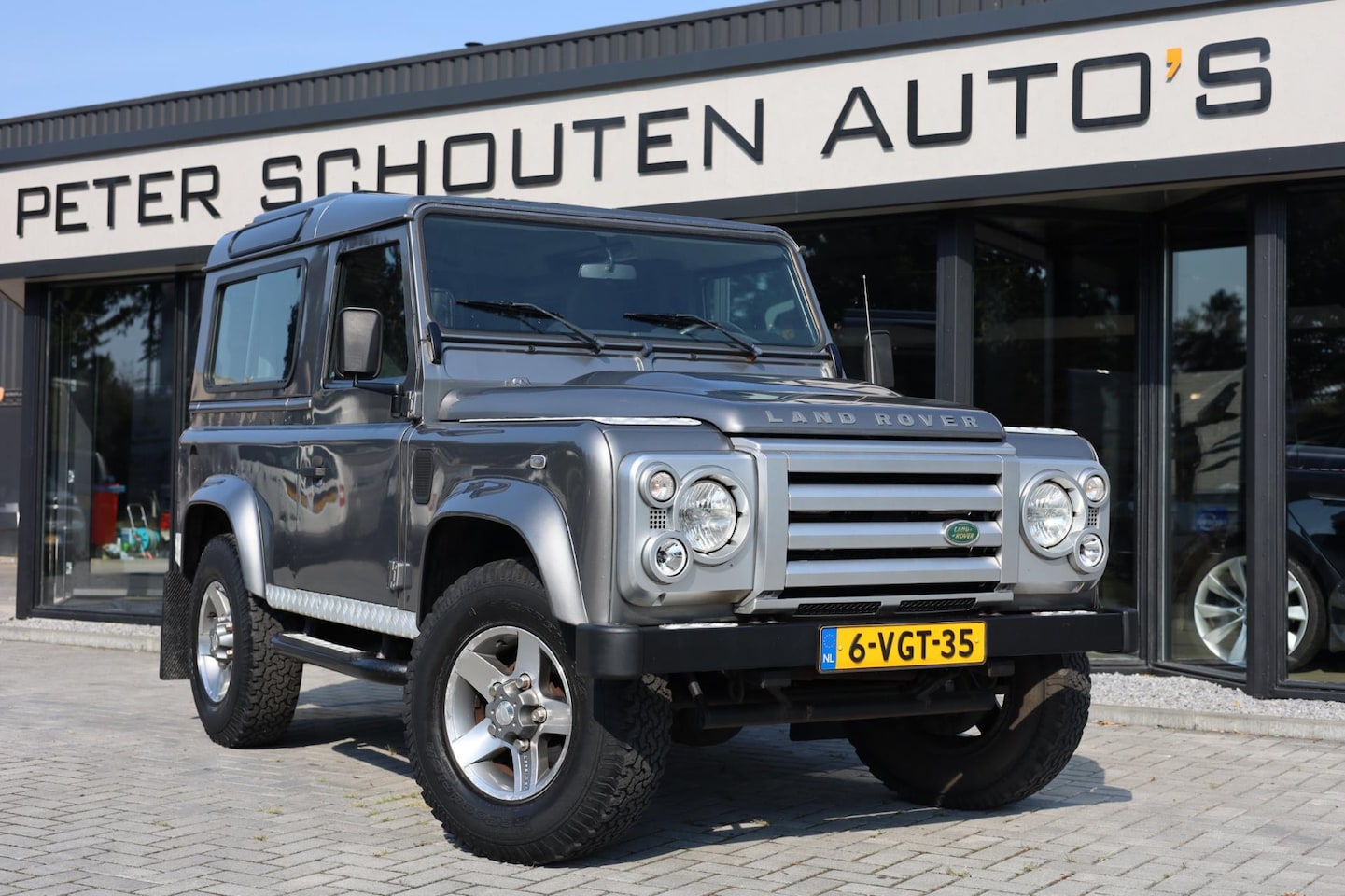 Land Rover Defender 90 - TD4 SW X-Tech | Airco | Leder | SVX | LMV | Youngtimer | 1e Eigenaar | - AutoWereld.nl