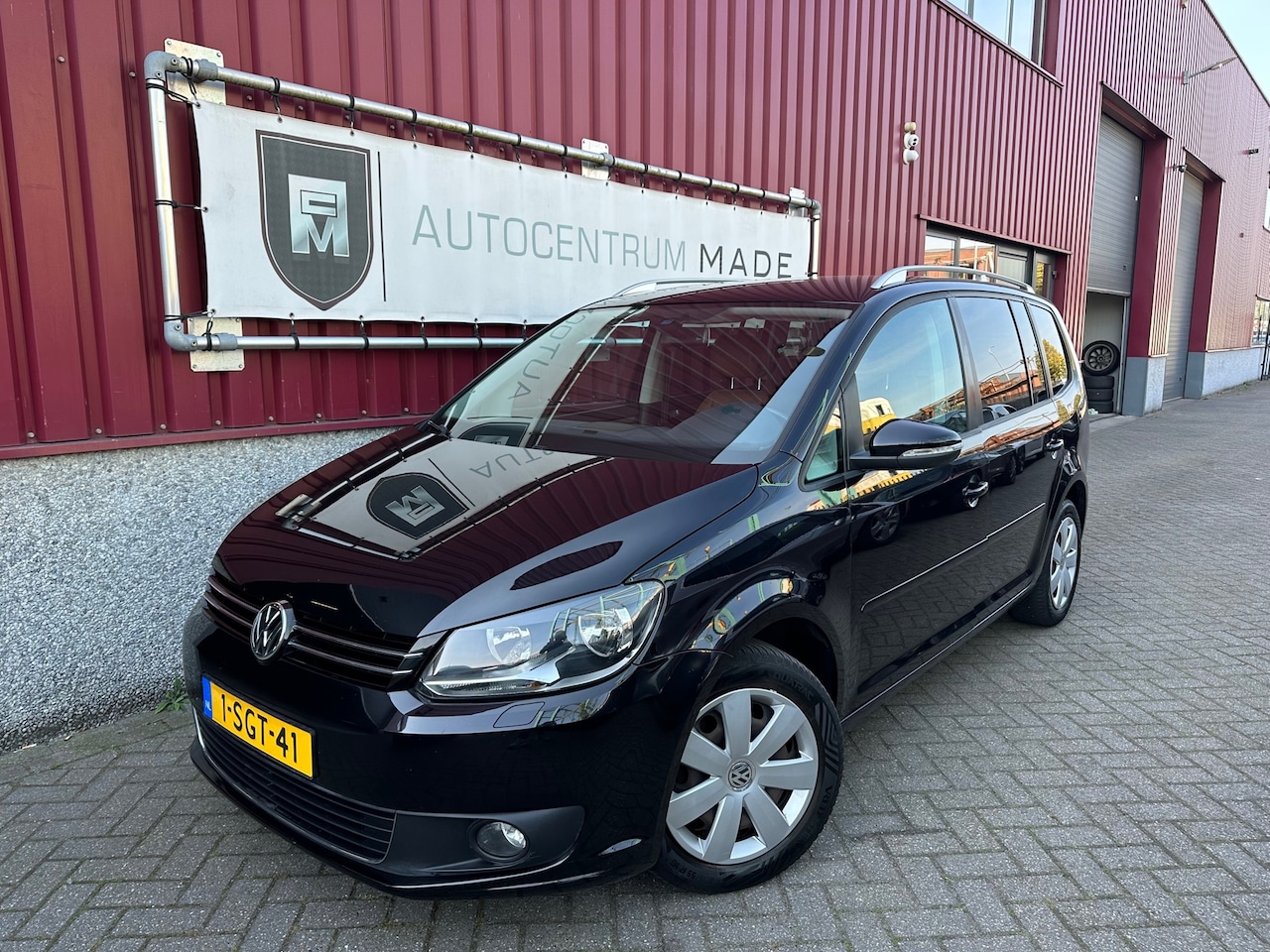 Volkswagen Touran - 1.2 TSI Comfortline BlueMotion 7p. // Leer // Navi / Clima // Trk.hk - AutoWereld.nl