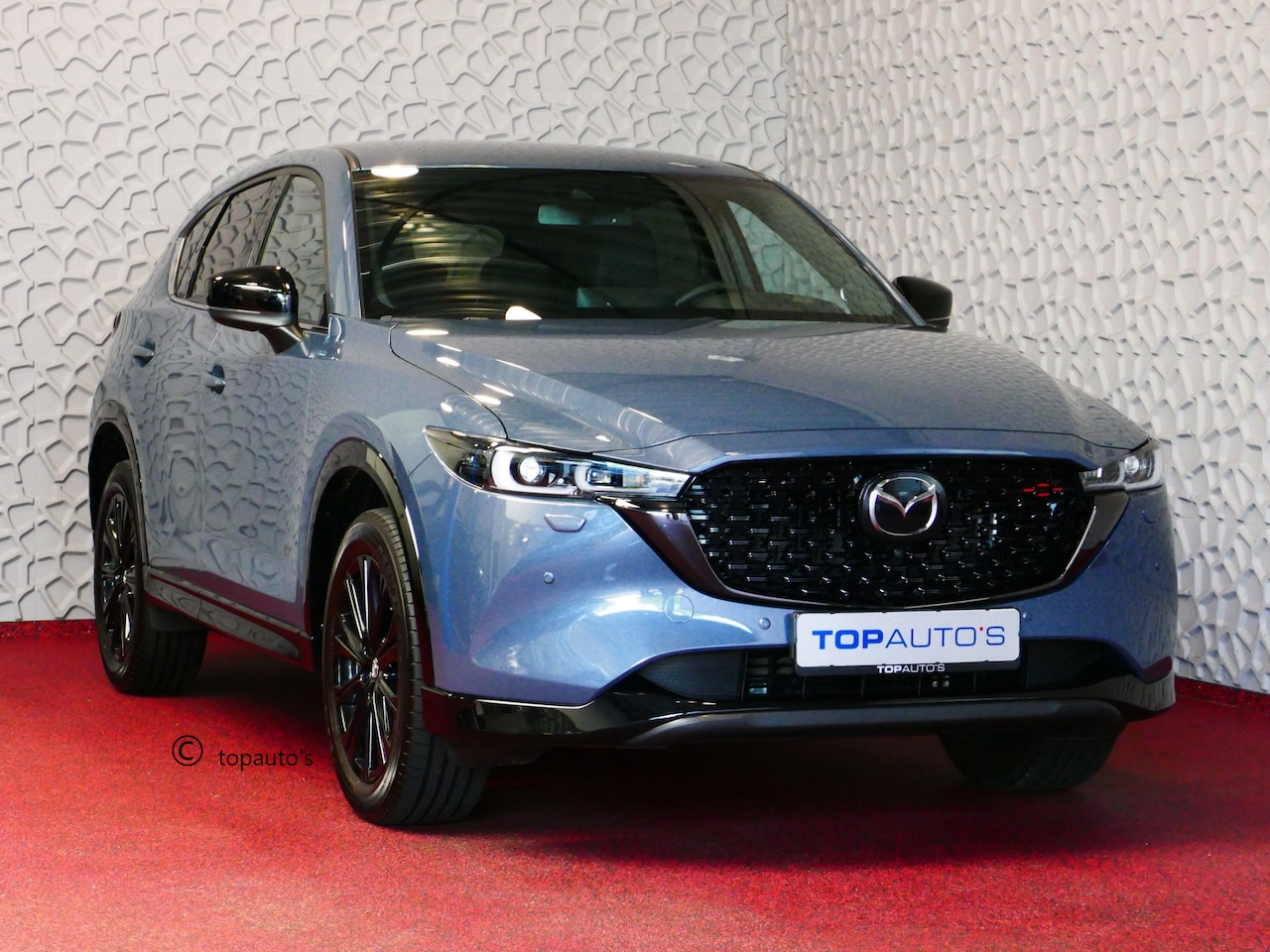 Mazda CX-5 - E-SKYACTIV MHEV 2.0 165 PK HOMURA LEER BOSE ELEK.KLEP HEADUP 360.CAMERA 19''LMV FULL LED C - AutoWereld.nl