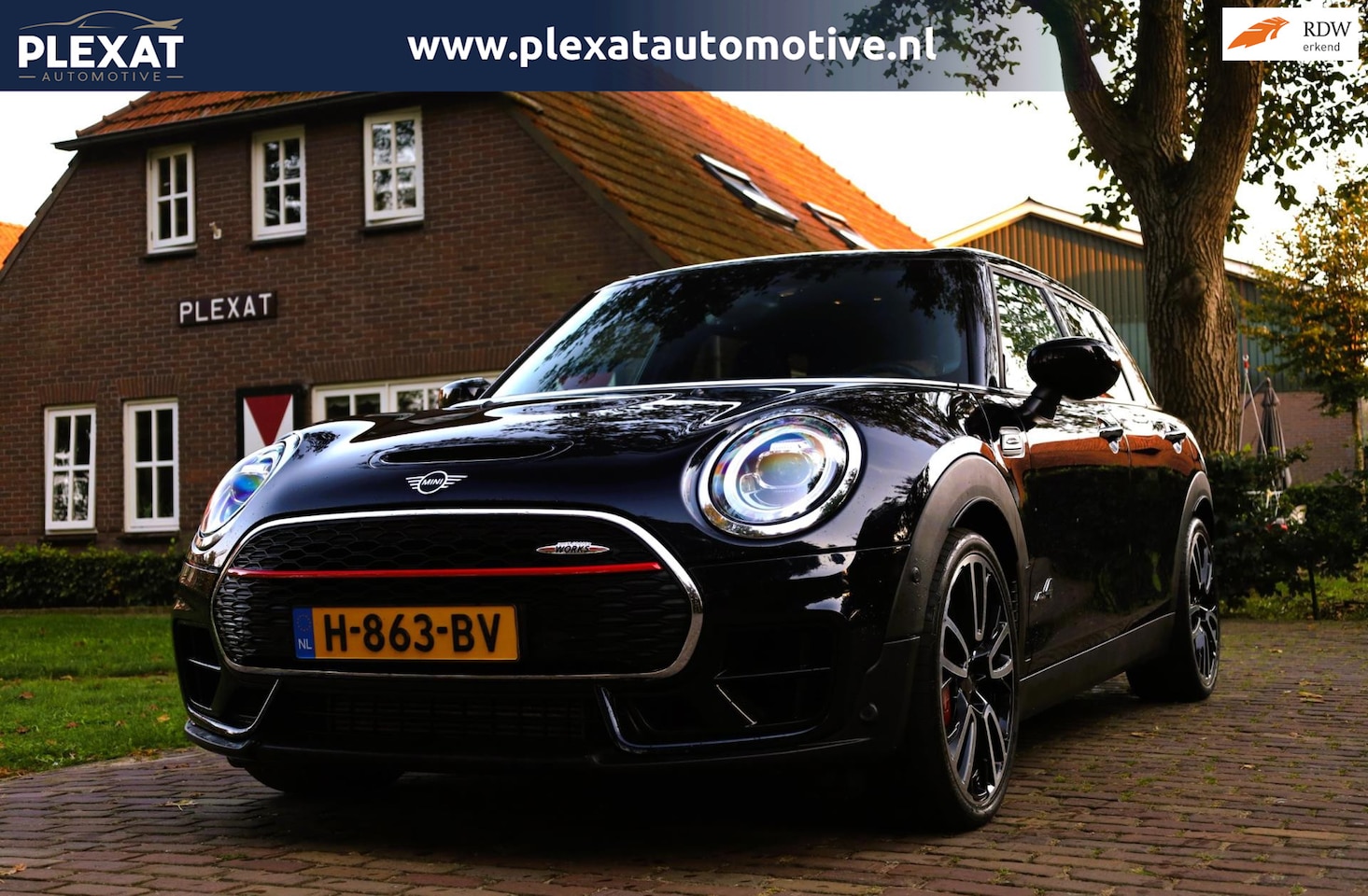 MINI Clubman - 2.0 JCW 306PK ALL4 Chili Aut. | Adap Cruise | Panorama | Harman-Kardon | Head-Up | NL. Aut - AutoWereld.nl