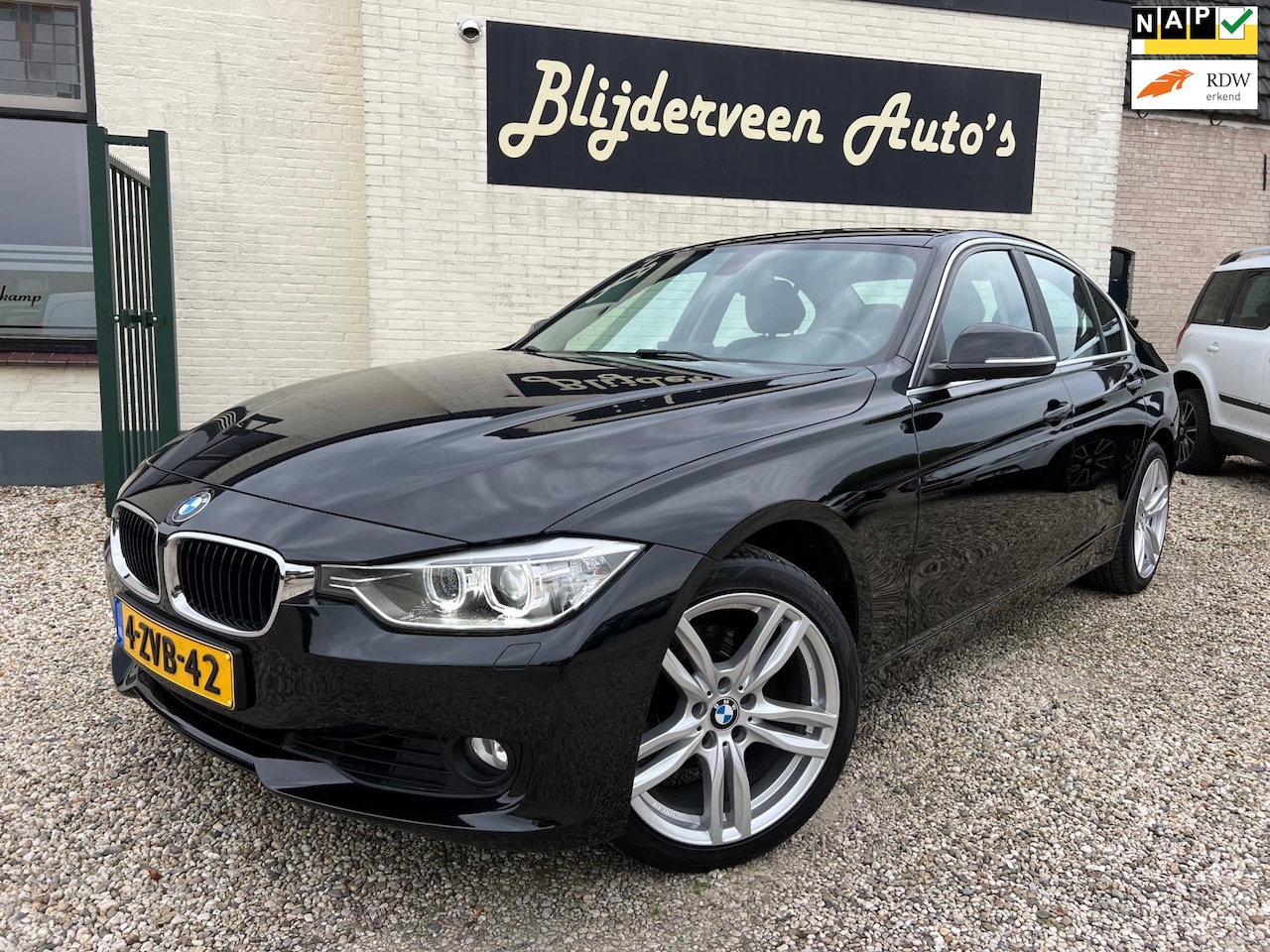 BMW 3-serie - 320i High Executive Org. NL | Navi | Leer | PDC | NAP - AutoWereld.nl