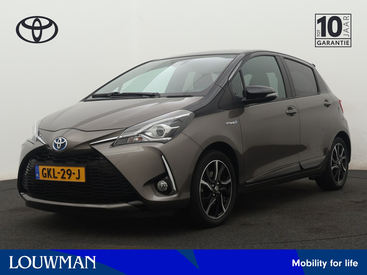 Toyota Yaris - 1.5 Hybrid 20y Bi-tone Limited | Camera | LM Velgen | - AutoWereld.nl