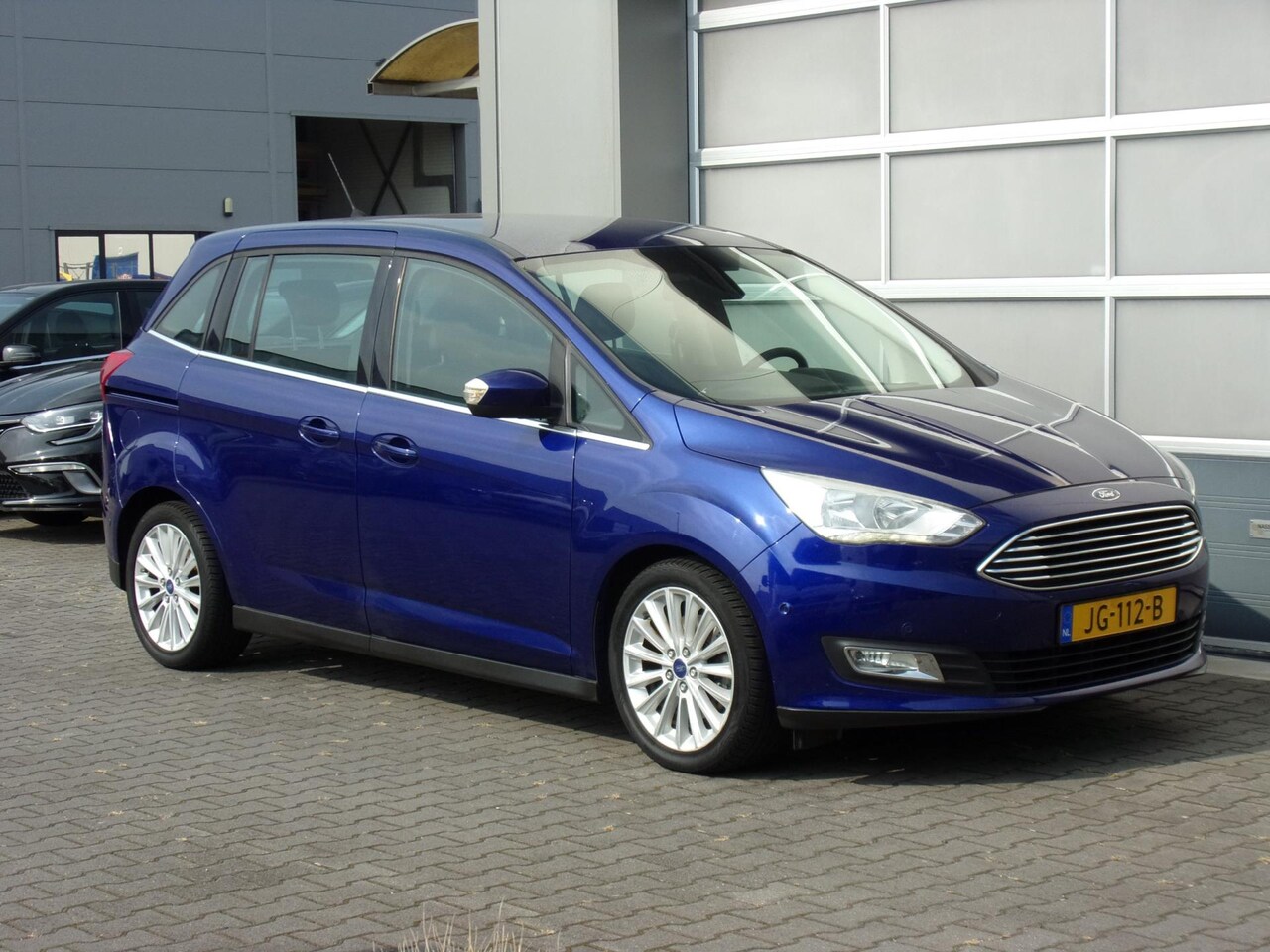 Ford Grand C-Max - 1.0 Titanium Clima/Navi/Cruise/PDC!! - AutoWereld.nl