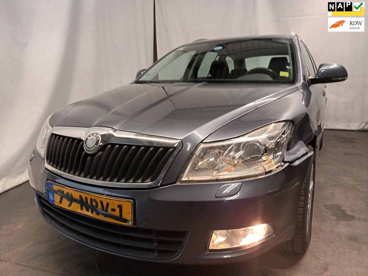 Skoda Octavia Combi - 1.2 TSI Elegance Business Line Schadeauto - AutoWereld.nl