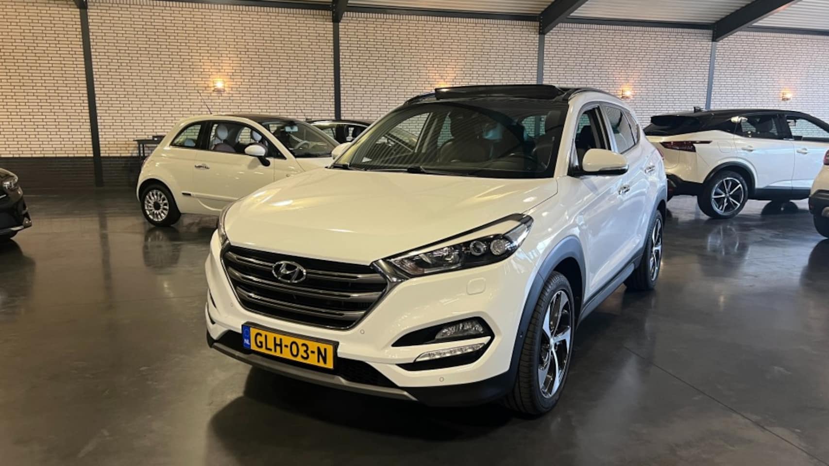 Hyundai Tucson - 1.6 T-GDI PREM. 4WD Executive - AutoWereld.nl