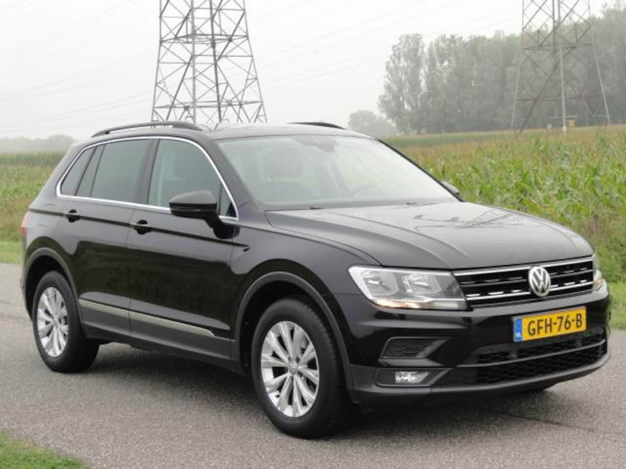 Volkswagen Tiguan - 1.4TSI 4Motion Business Met ECC+NAVIG+ELEKTR KLEP - AutoWereld.nl