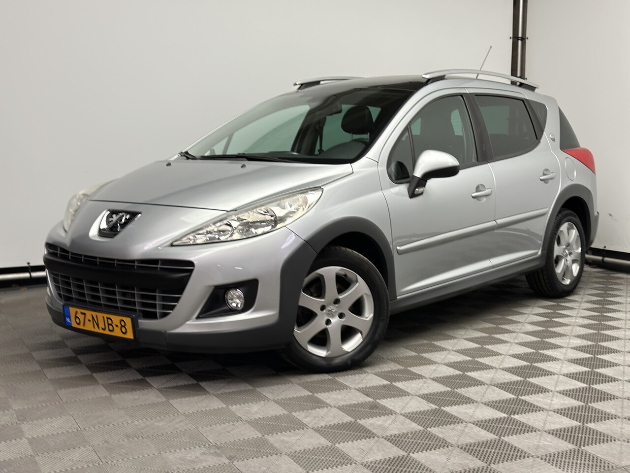 Peugeot 207 SW Outdoor - 1.6 VTi ECC Cruise Pano 1e Eigenaar - AutoWereld.nl