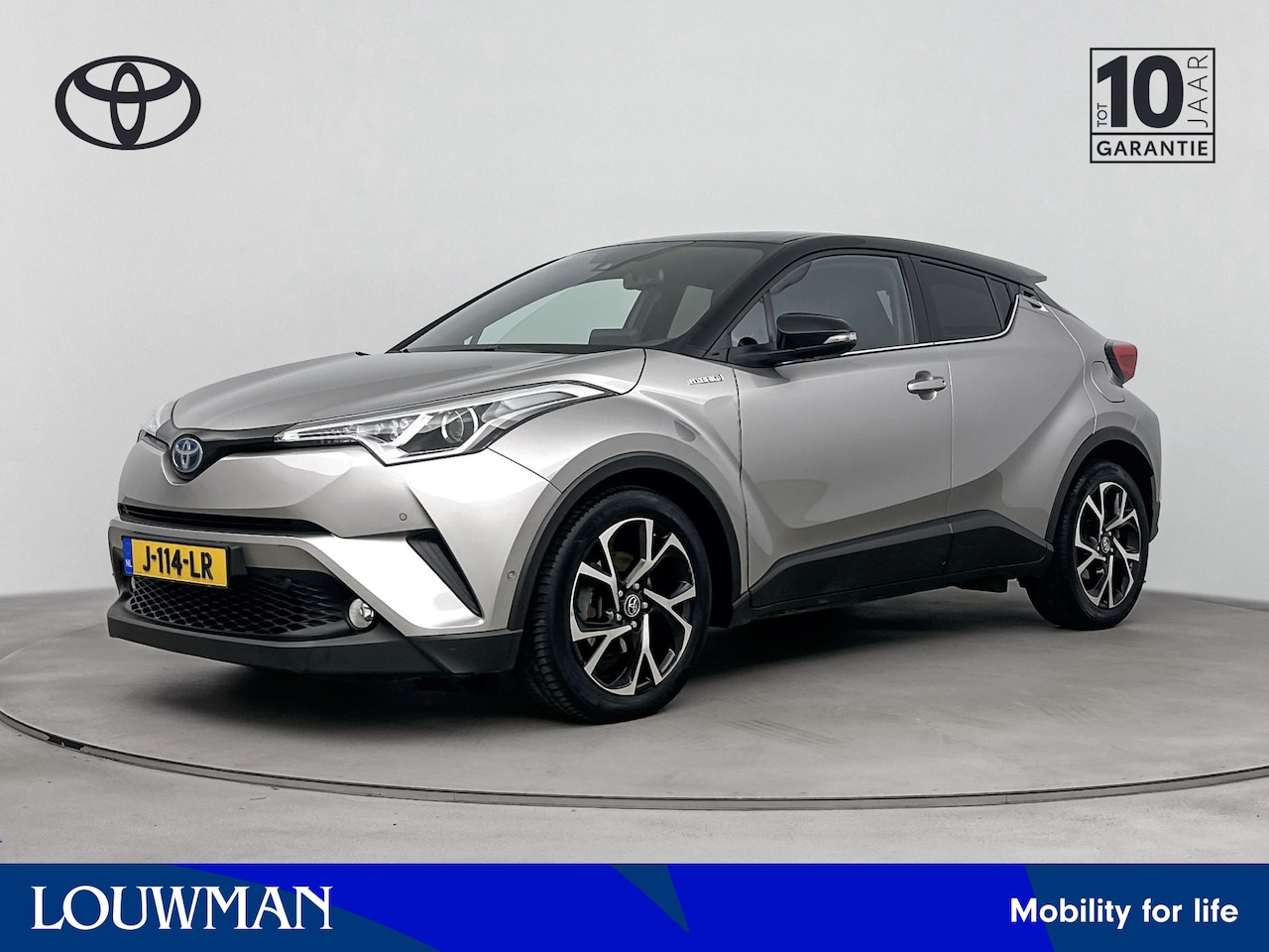 Toyota C-HR - 1.8 Hybrid Bi-Tone Limited | Dodehoek detector | Navigatie | - AutoWereld.nl