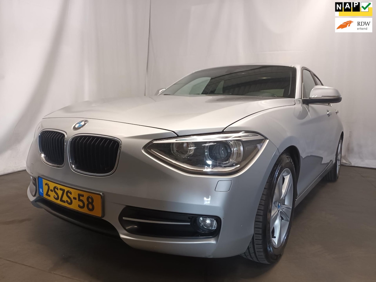 BMW 1-serie - 116d EDE High Executive Navi Leer - AutoWereld.nl