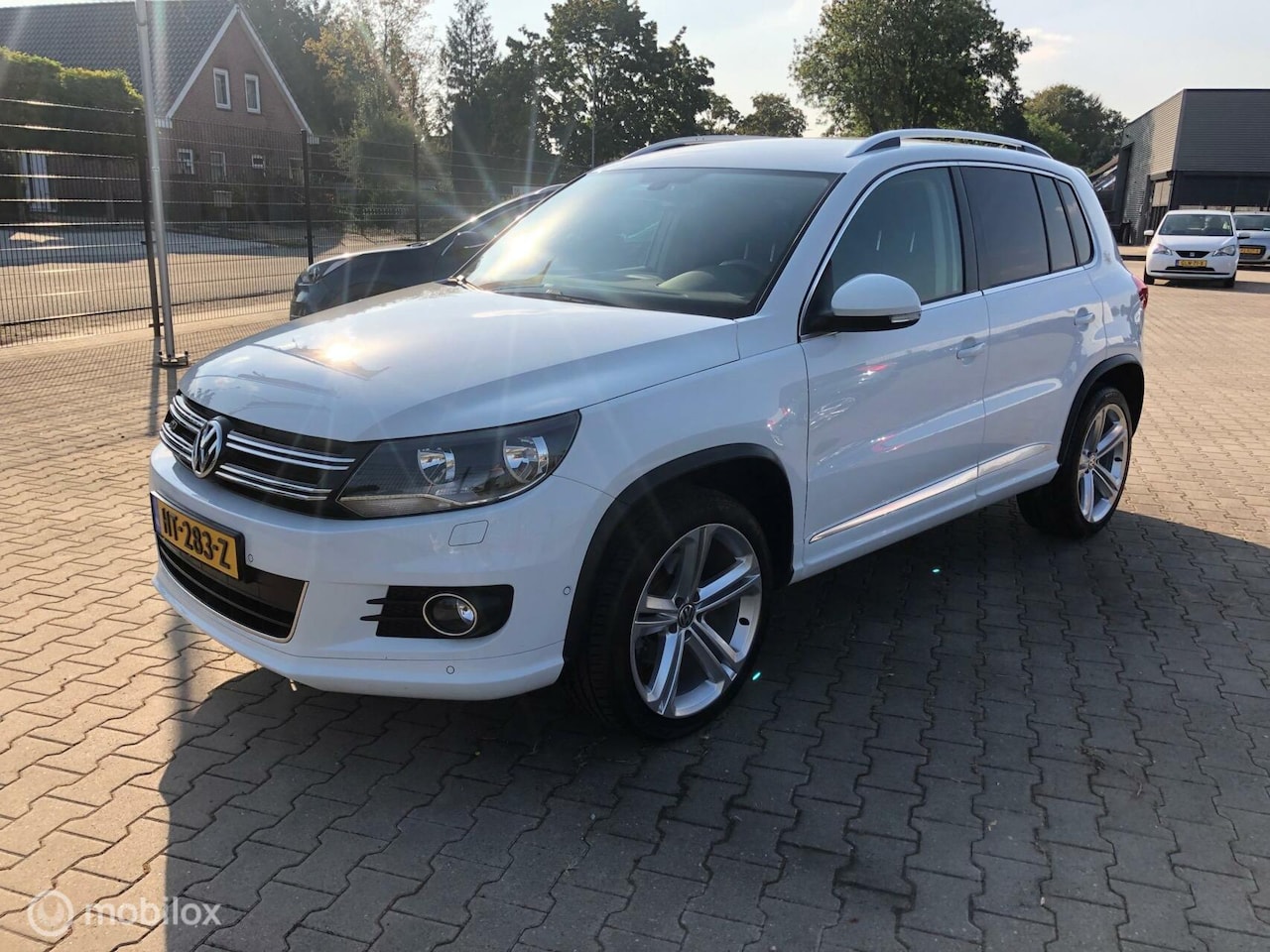 Volkswagen Tiguan - 1.4 TSI R-Line in nw staat ..122.975 km - AutoWereld.nl