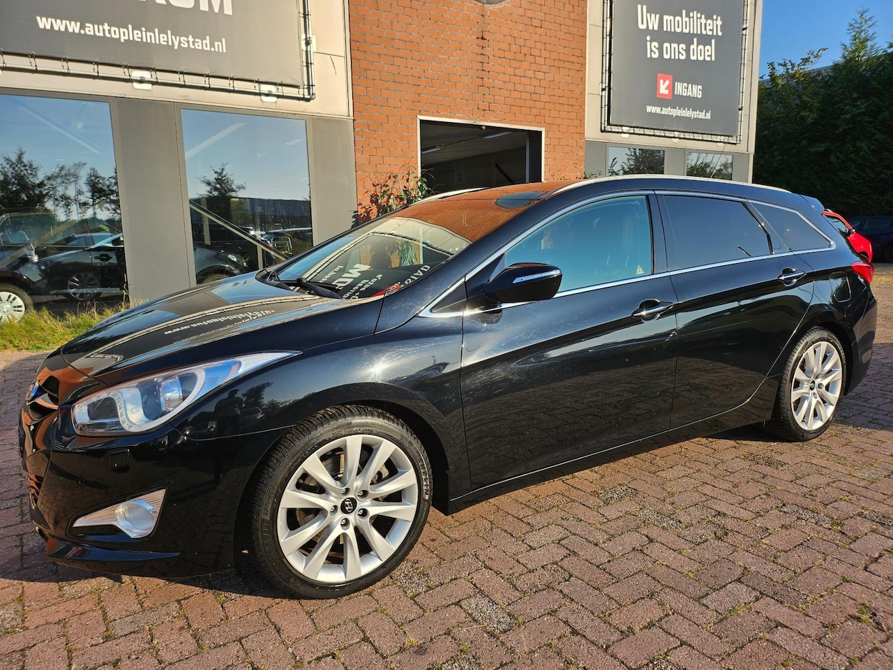 Hyundai i40 Wagon - 2.0 GDI i-Catcher PANO CAMERA AUT LEER - AutoWereld.nl