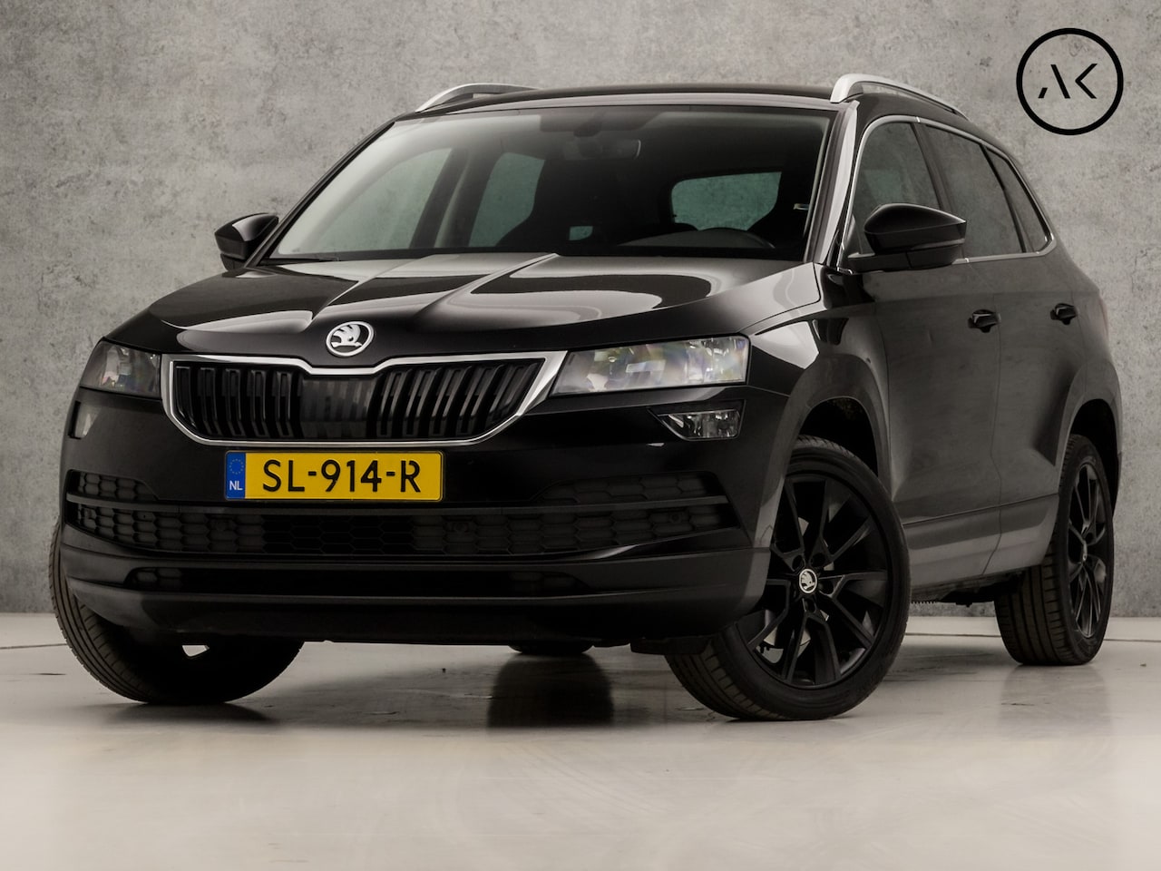 Skoda Karoq - 1.0 TSI Sport Black Edition (KUIPSTOELEN, APPLE CARPLAY, GROOT NAVI, CLIMATE, GETINT GLAS, - AutoWereld.nl