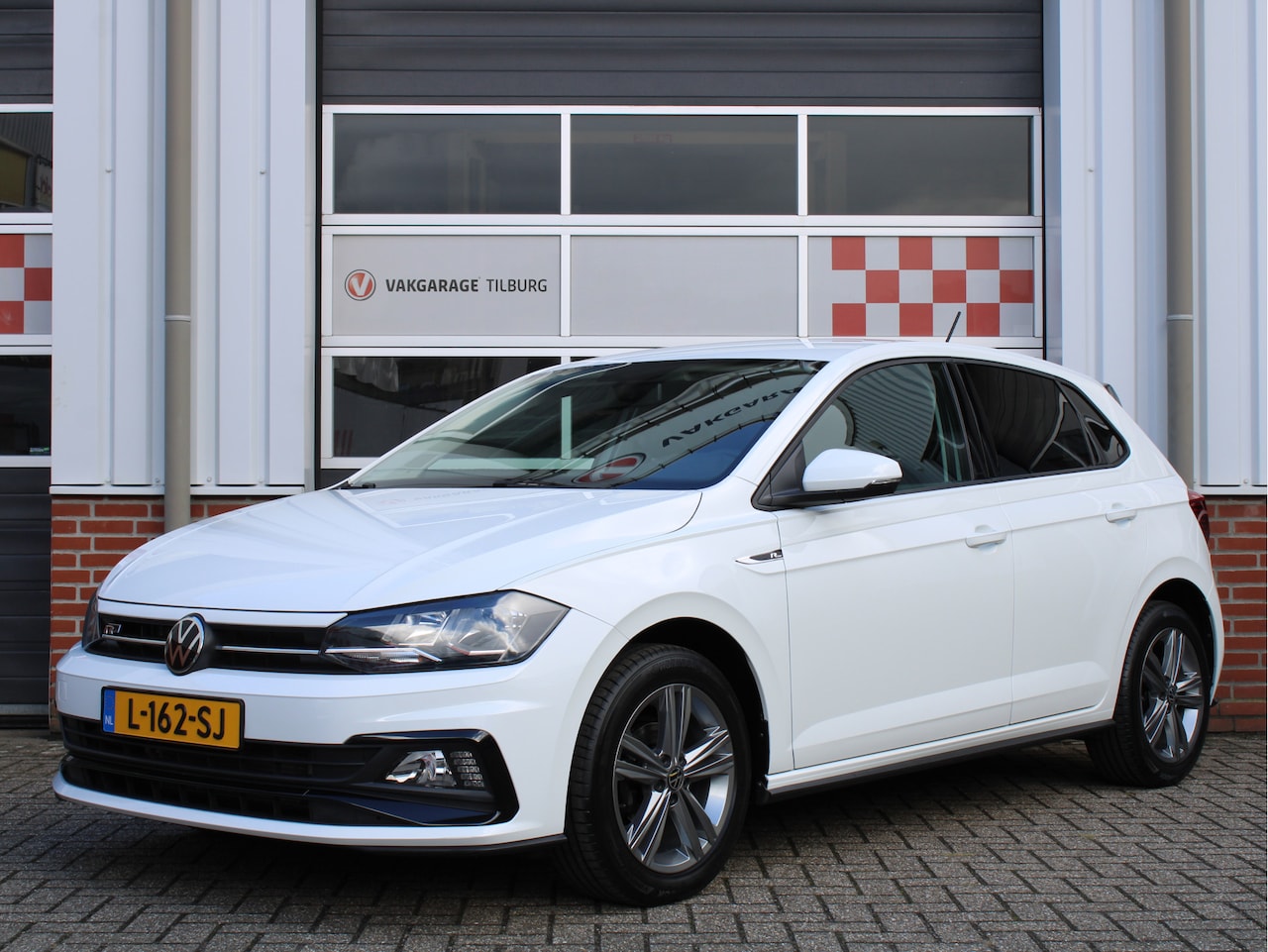 Volkswagen Polo - 1.0 TSI Automaat R-Line Edition /NAVI/PDC/Elek. ramen/16'LM/Apple carplay/Android auto/DAB - AutoWereld.nl