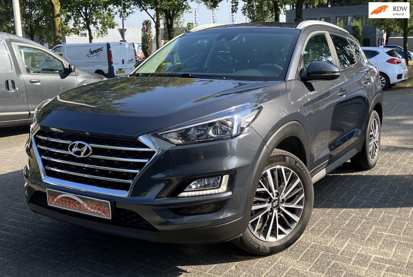 Hyundai Tucson - 1.6 GDi Premium Camera Navi Leer L.m Cruisecontrol Leer - AutoWereld.nl