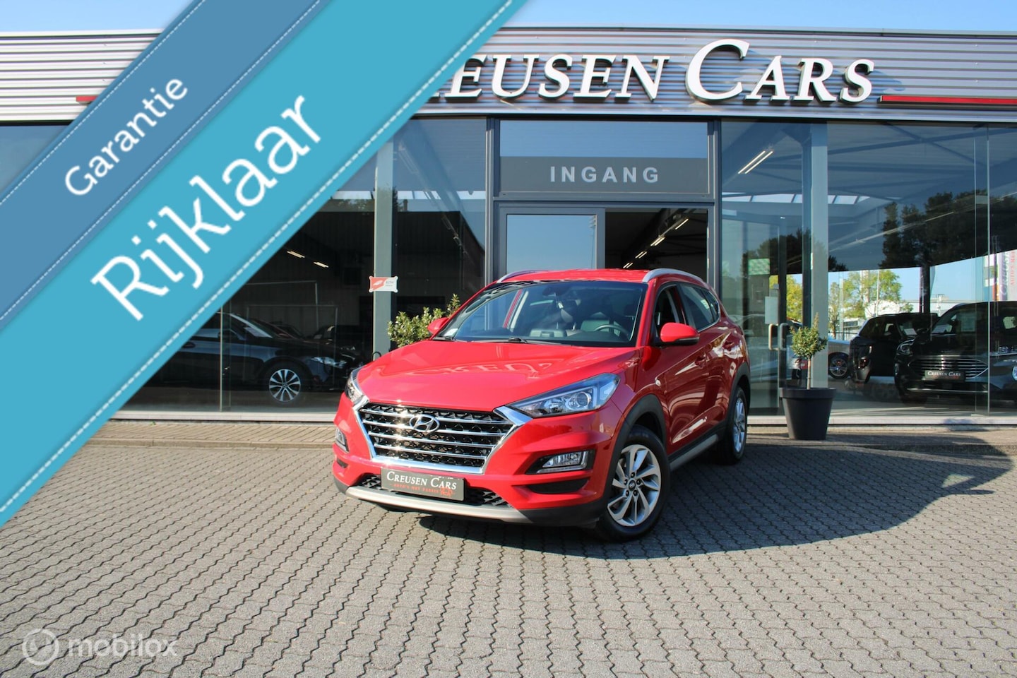 Hyundai Tucson - 1.6 T-GDI Comfort/Trekhaak/Navi/Tel/Pdc/Cam/ - AutoWereld.nl