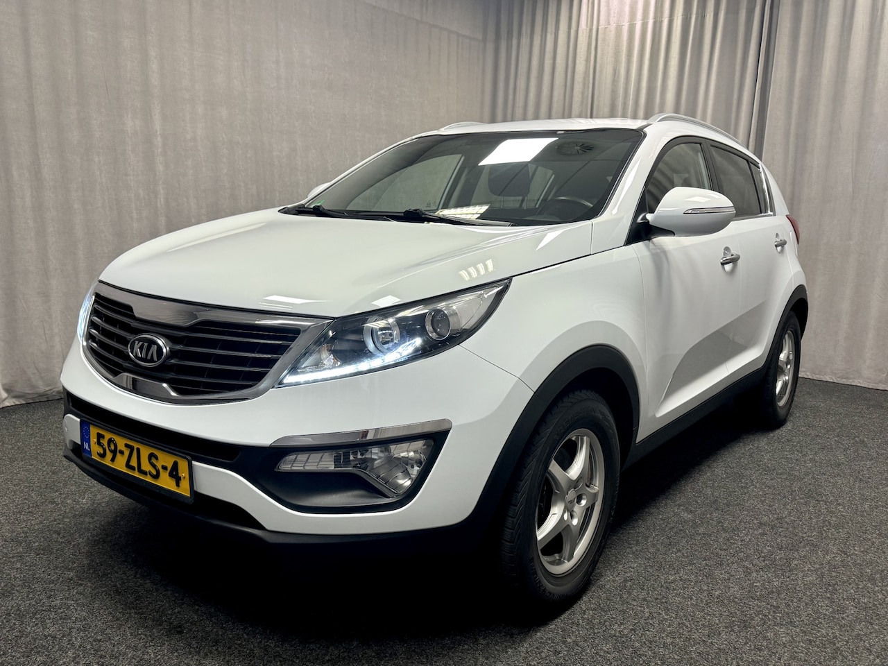 Kia Sportage - 1.6 GDI Plus Pack | Airco | Cruise | LED | - AutoWereld.nl