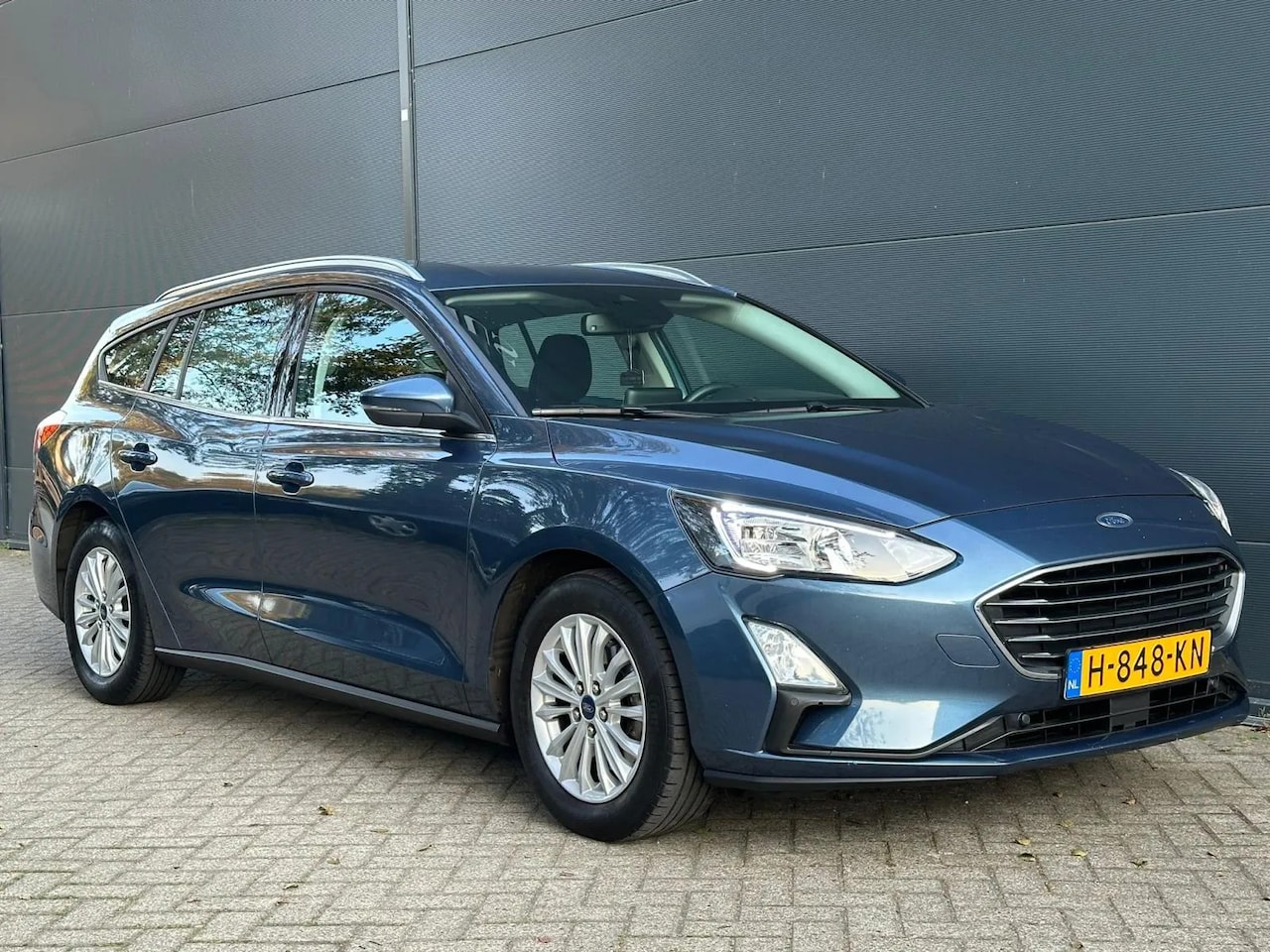 Ford Focus Wagon - 1.0 EcoBoost Titanium Business NAVI|PKRSENSOR|KEYLESS|CRUISE|NWE APK - AutoWereld.nl