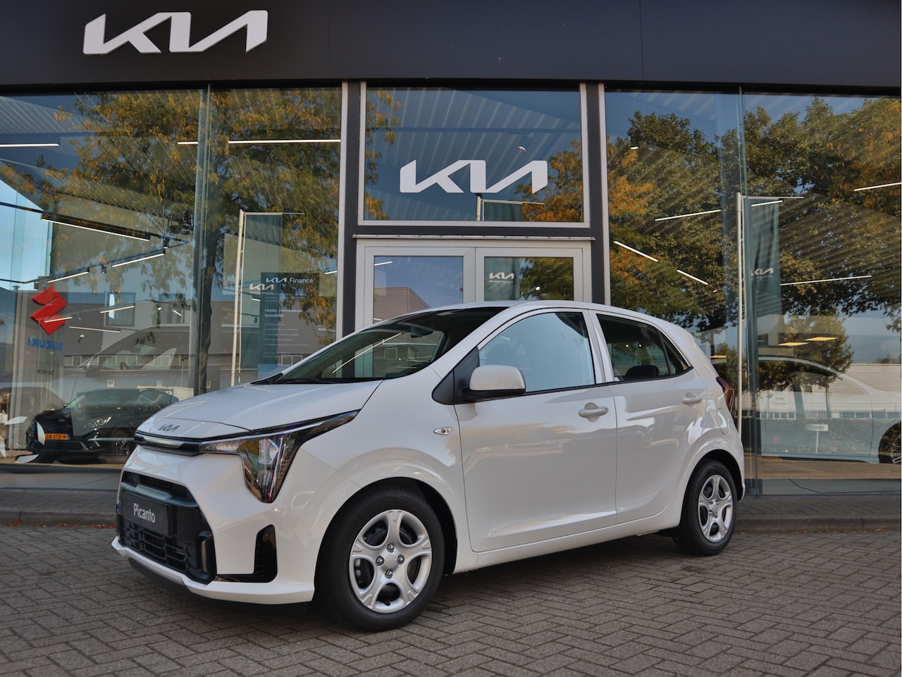 Kia Picanto - 1.0 DPI DynamicLine Airco Cr.Control SmartLink-Navi+Camera+BT+USB 14"LMV 7jr.Garantie - AutoWereld.nl