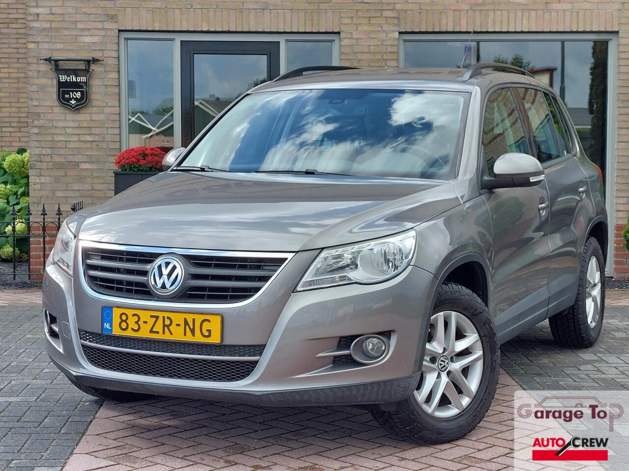 Volkswagen Tiguan - 1.4 TSI Comfort&Design 4Motion | Trekhaak | 100% onderhouden | NAP - AutoWereld.nl