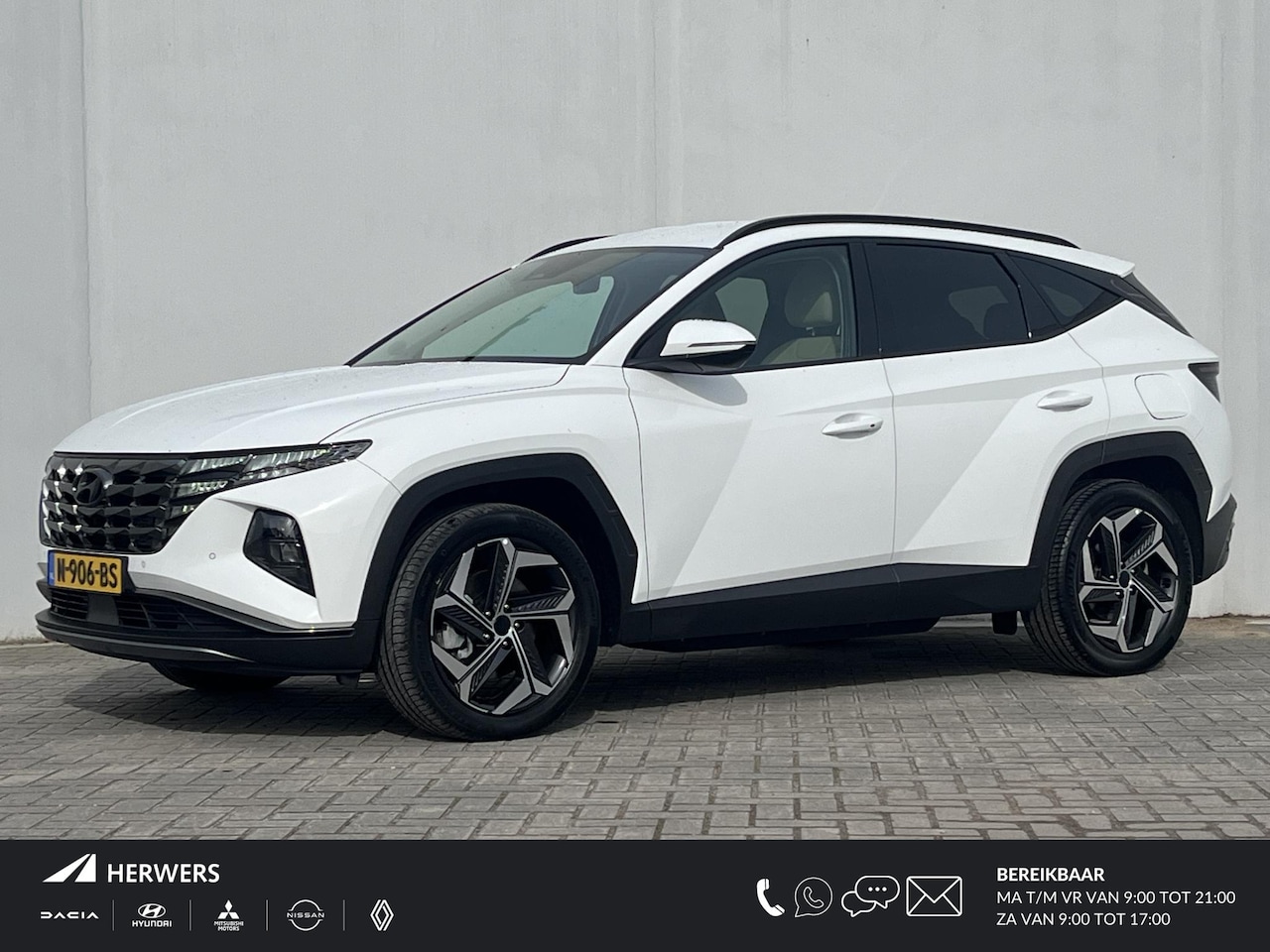 Hyundai Tucson - 1.6 T-GDI PHEV 265PK Automaat Comfort Smart 4WD / Lederen bekleding / Adaptieve cruise con - AutoWereld.nl