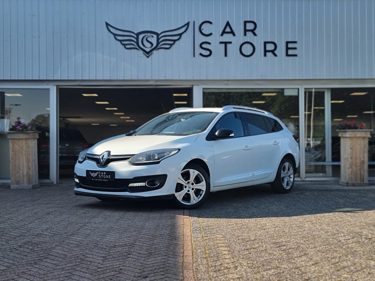 Renault Mégane Estate - 1.6 dCi / CRUISE / CLIMA / NAV / 17" - AutoWereld.nl