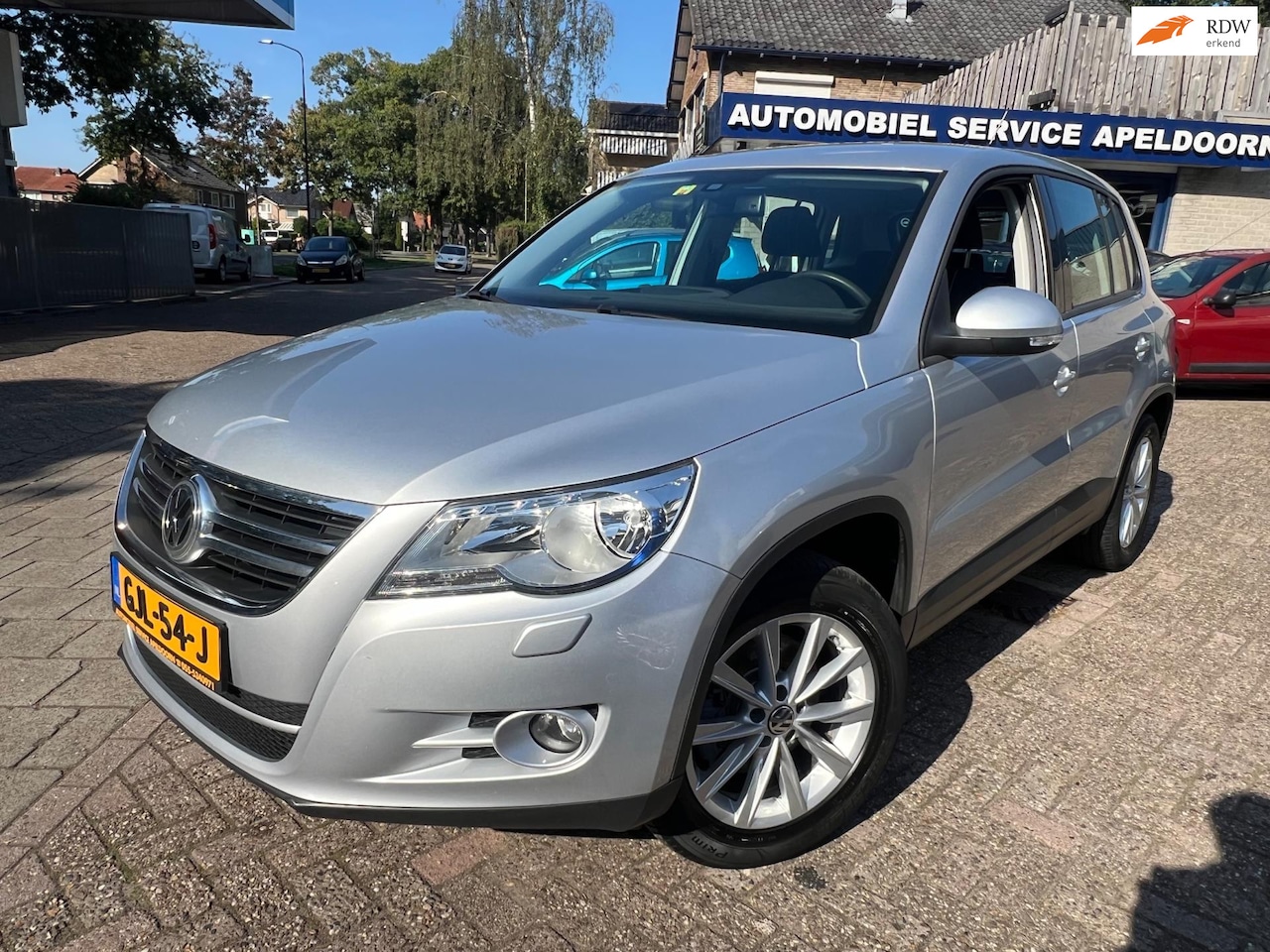 Volkswagen Tiguan - 1.4 TSI Sport&Style *AIRCO*CRUISE*STOELVERW.*PDC*ELEKTR. PAKKET*LM. VELGEN* - AutoWereld.nl